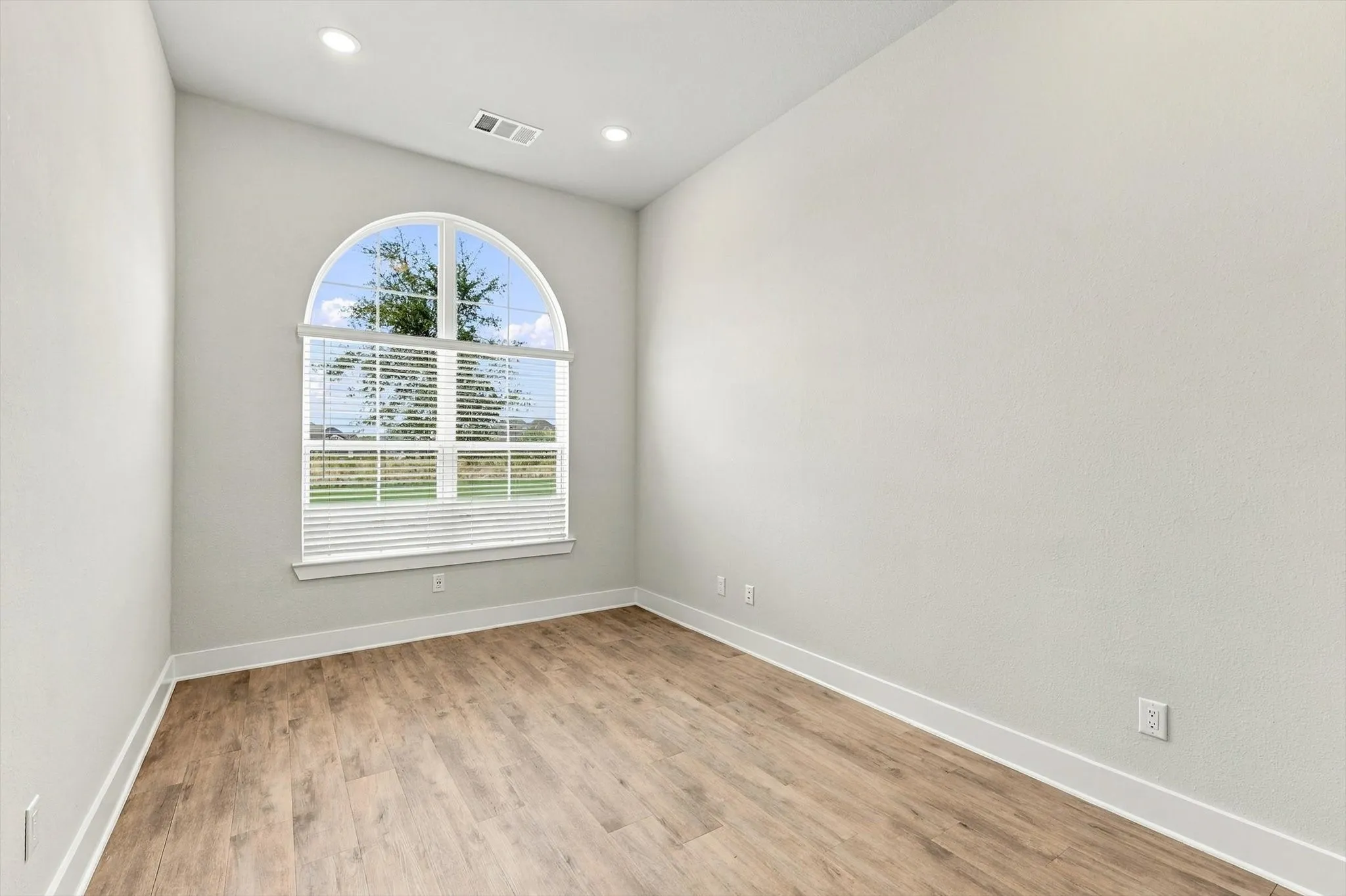 The office space is off the front foyer and features double doors.