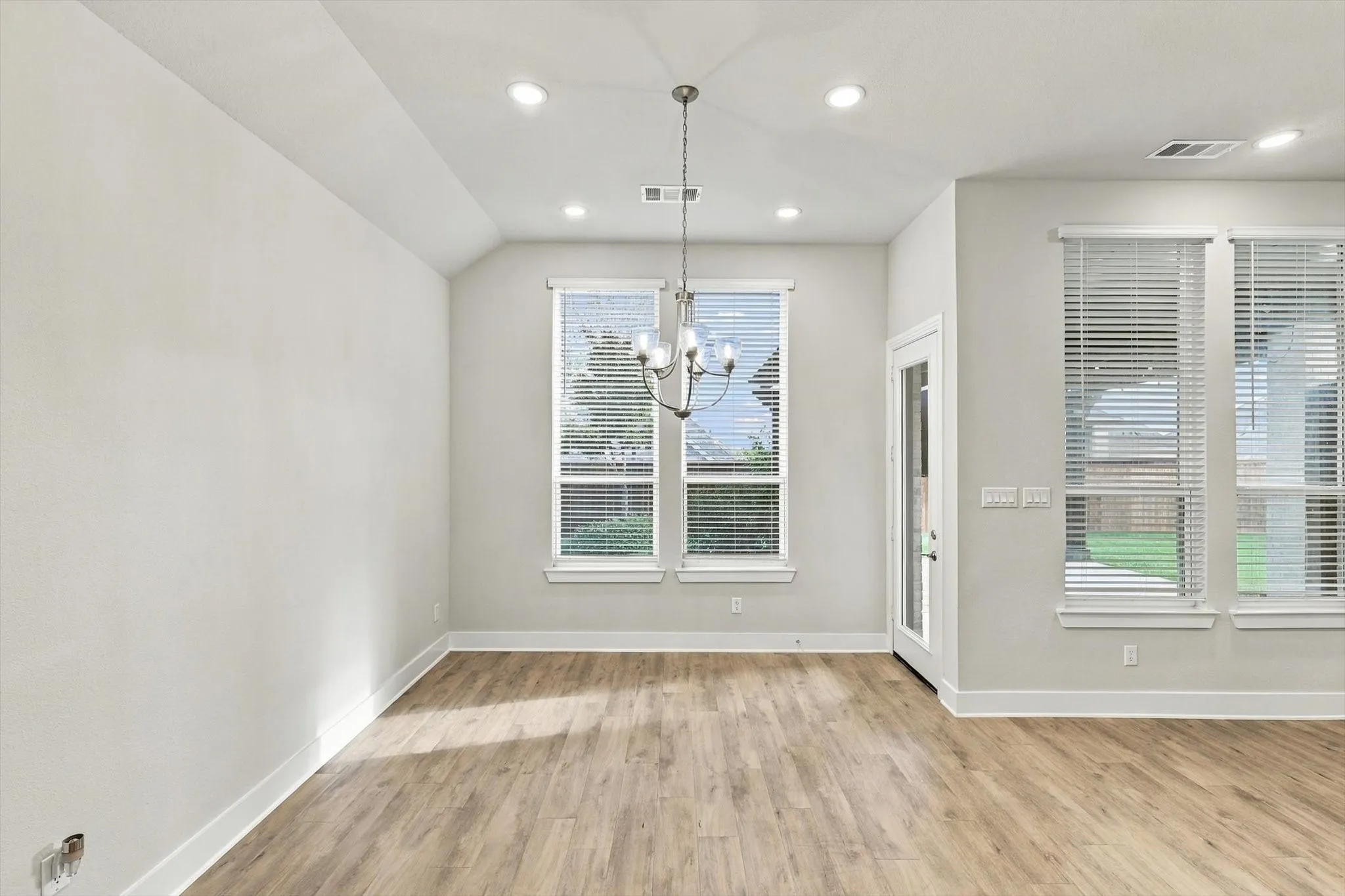 Dining area overlooks the backyard