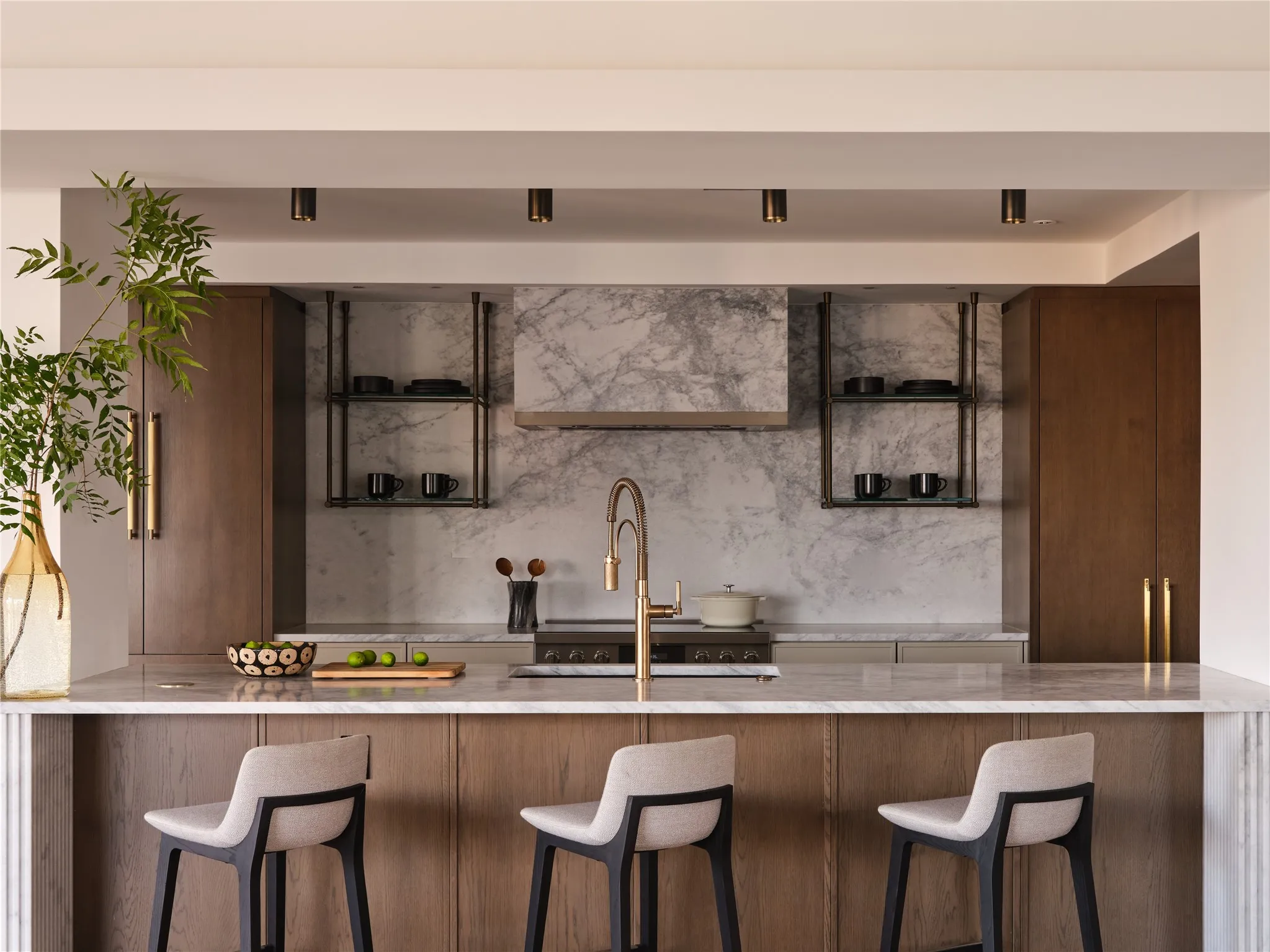 Buster+Punch®  hardware and Bosch appliances complete the sophisticated look.