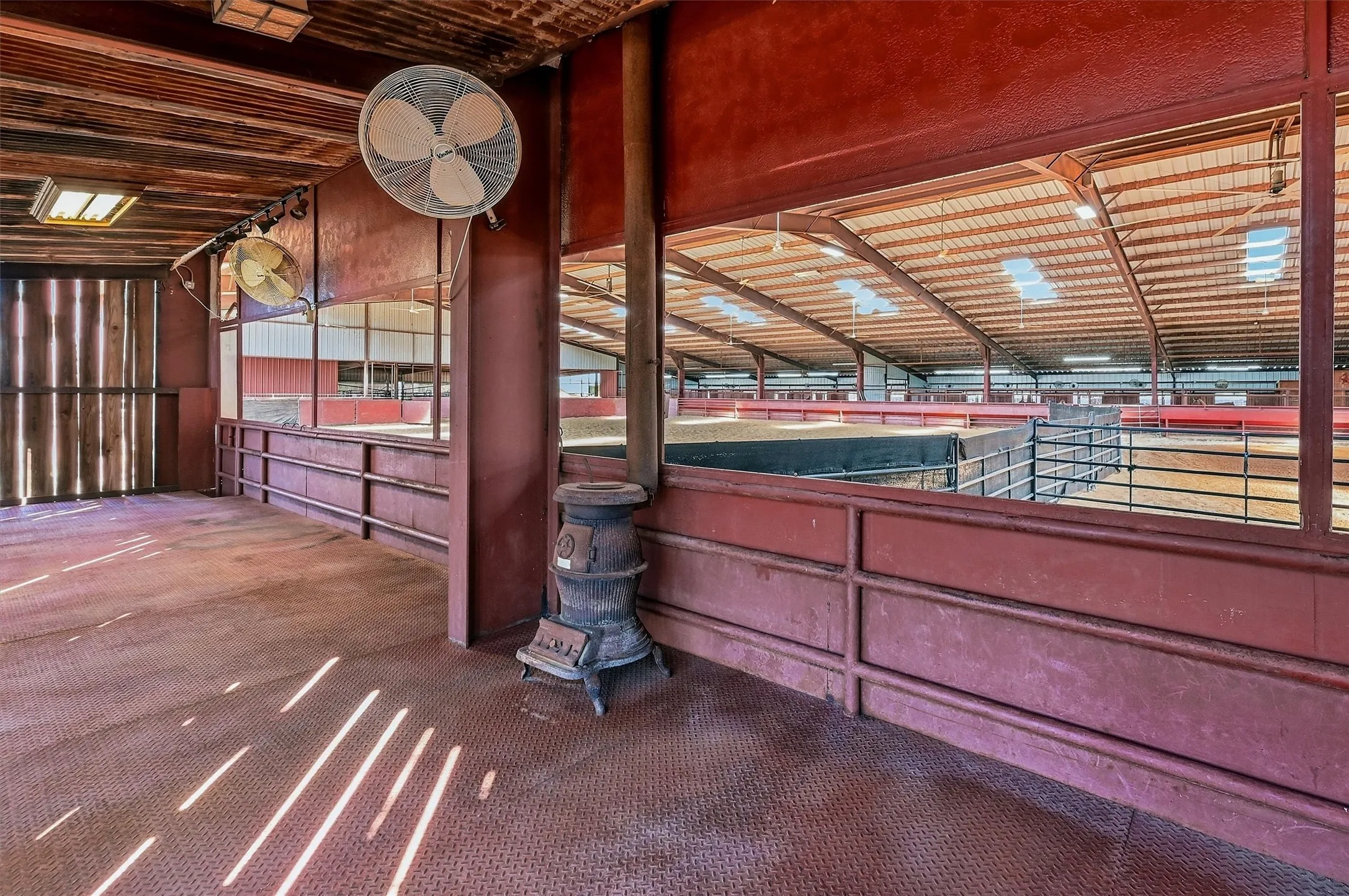 Lounge or viewing area with wood burning stove.
