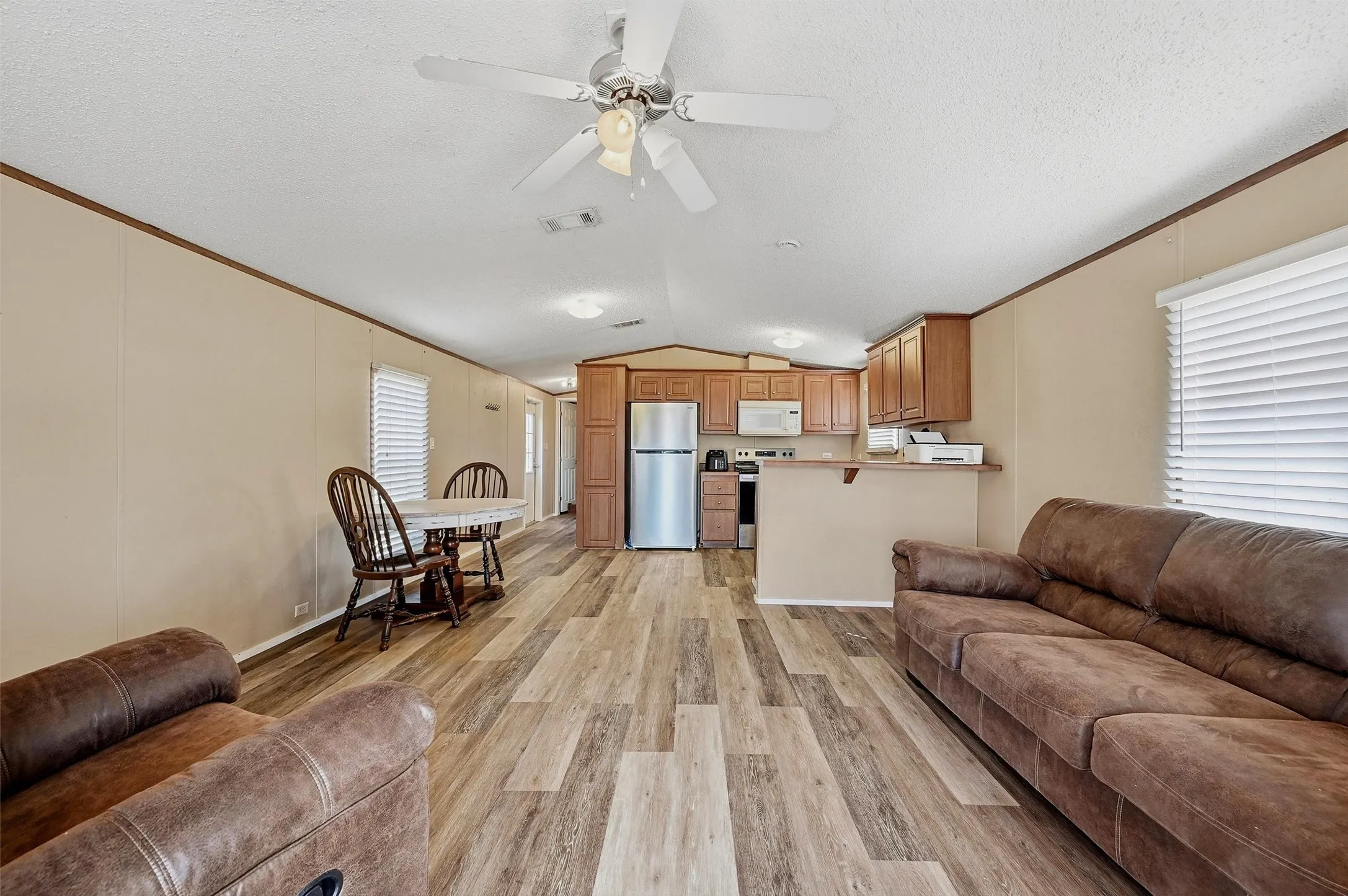 Living area in one of the single-wide mobile homes.
