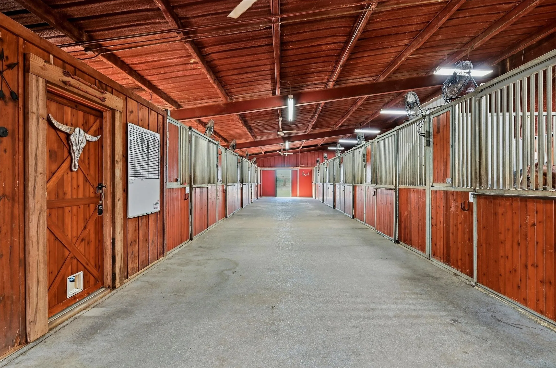 Wide concrete aisles in all stall alley ways.