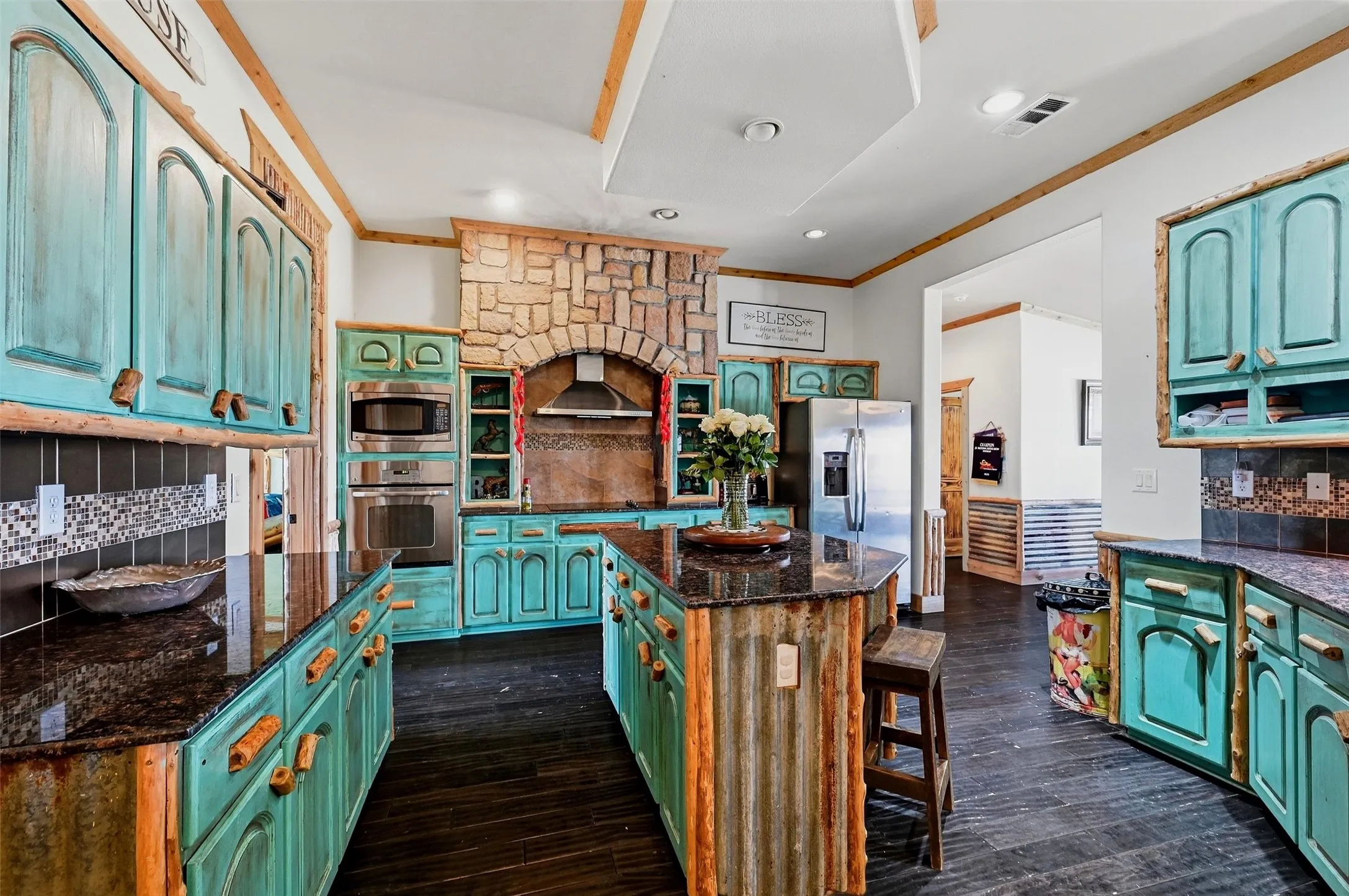 Triple-wide kitchen with an eat-at island.