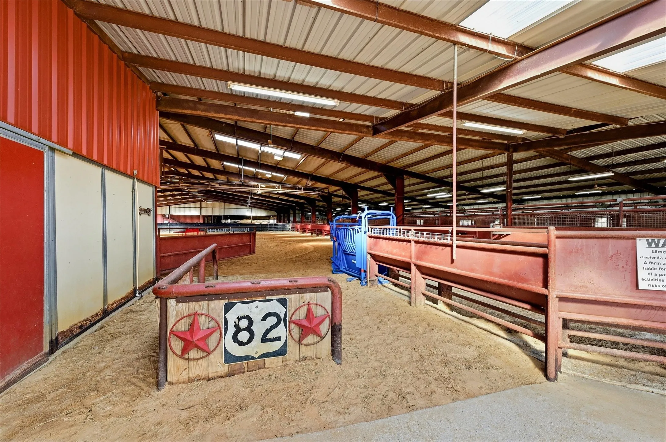 Gate into the arena - roping chute and return.