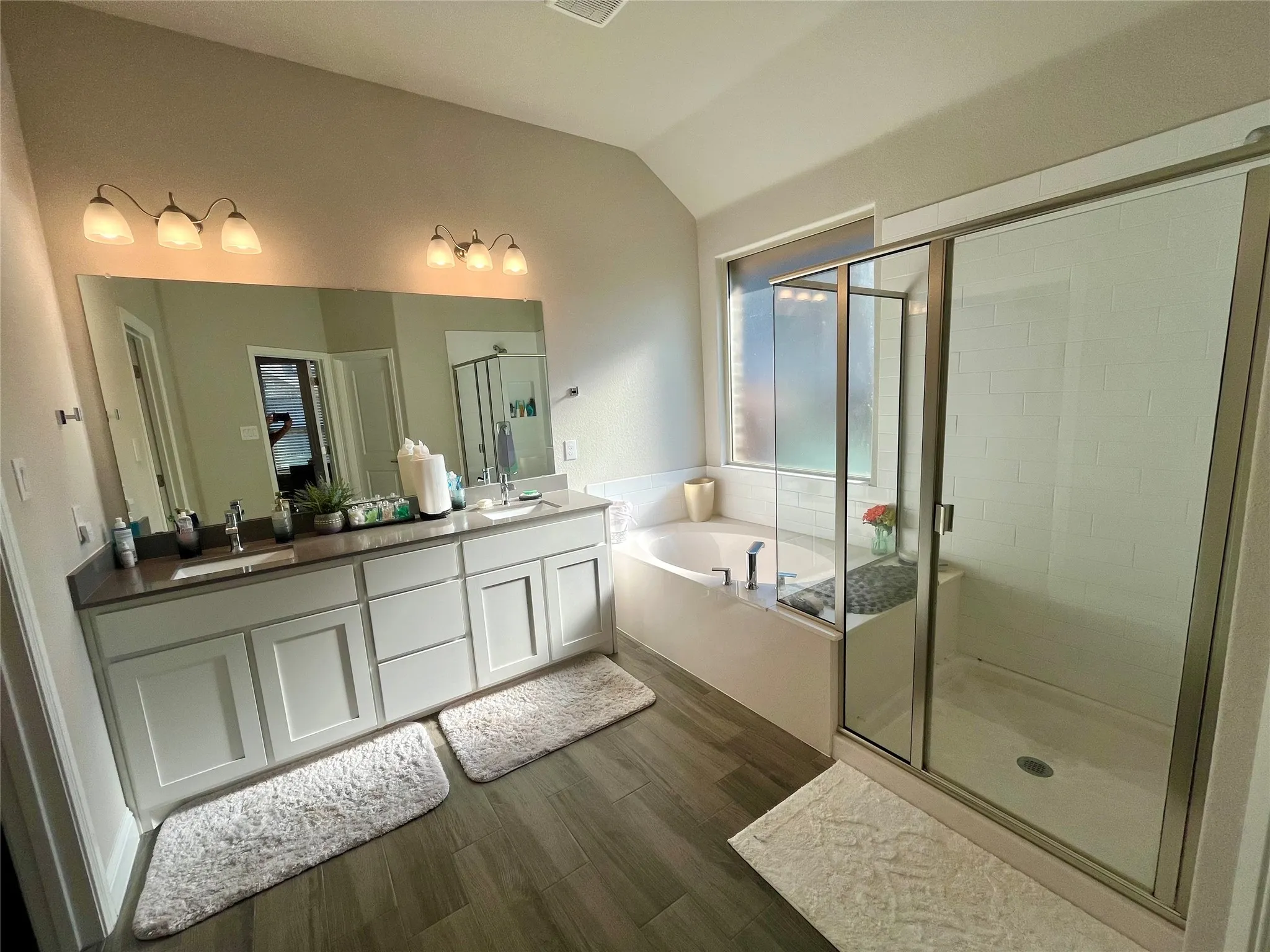 Dual vanity with undermount sinks and dark countertops