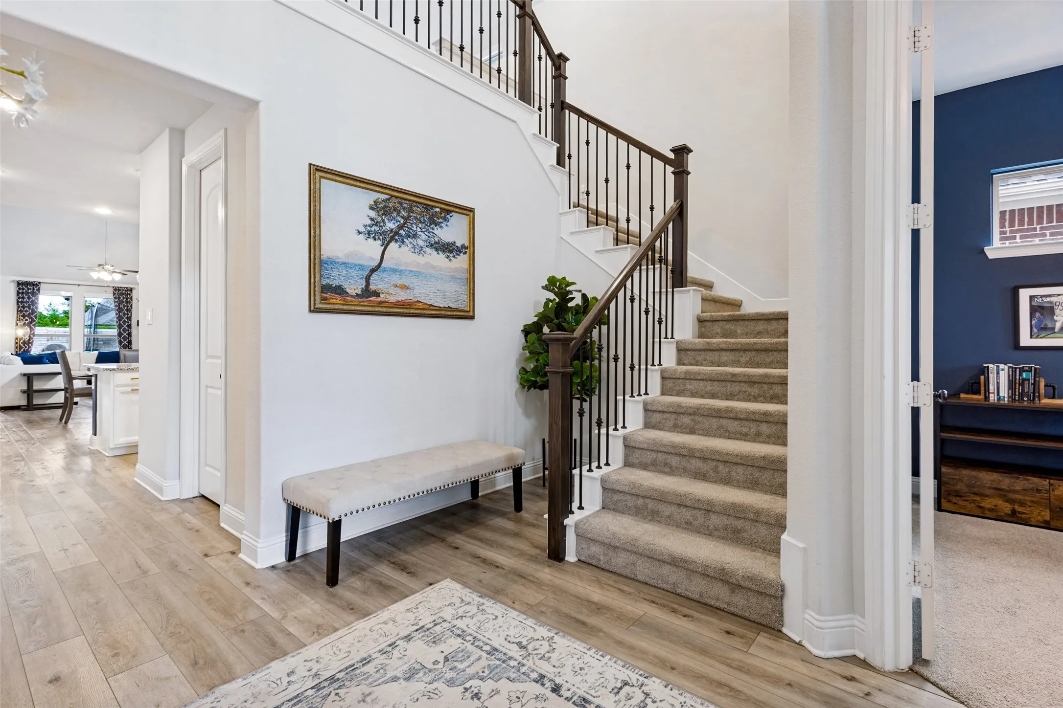 Foyer entrance with access to office and upstairs