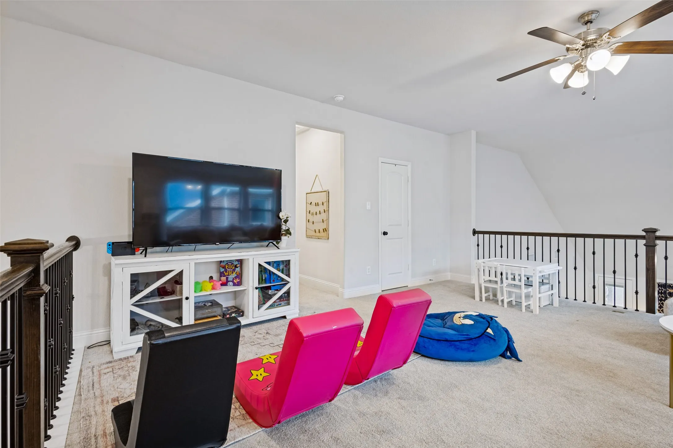 Game room overlooking the downstairs are