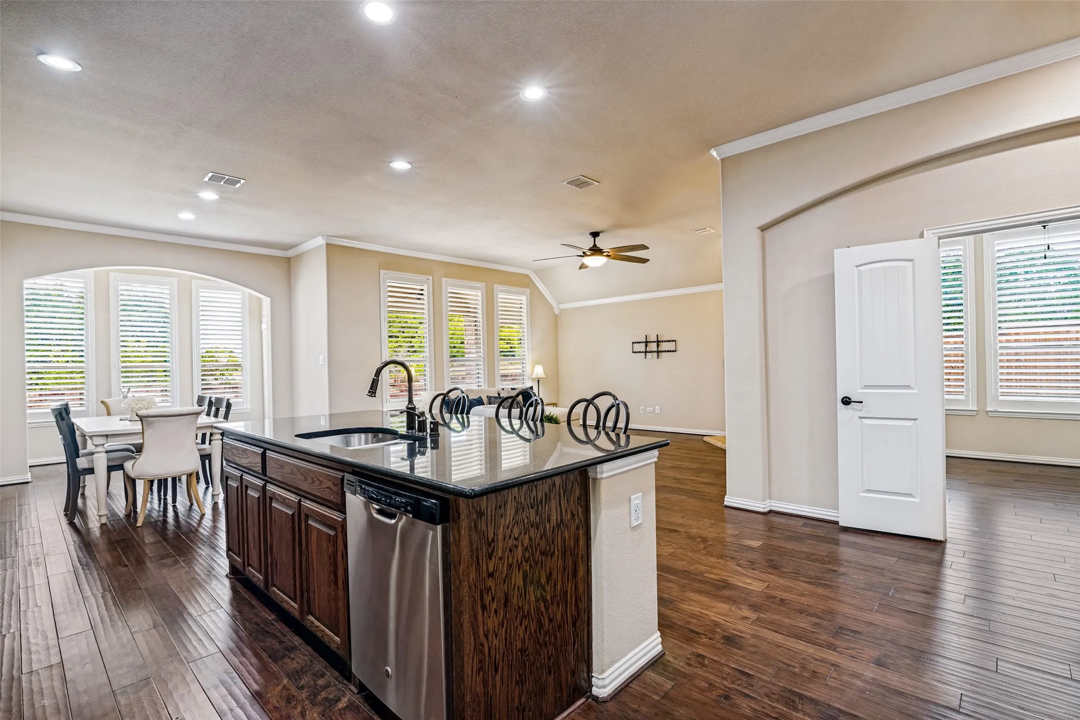 Stunning oversized Kitchen has Great Island, stainless appliances, including gas cooktop.