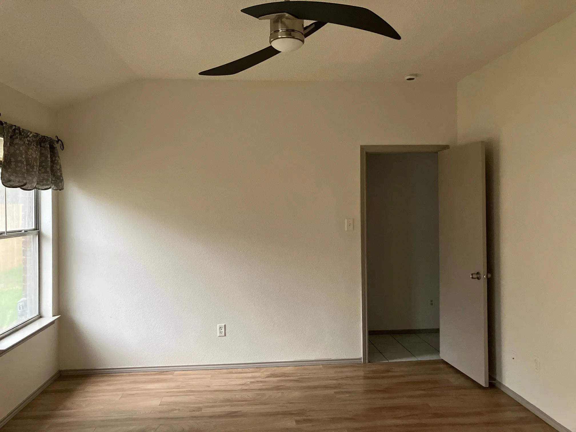 Wood-finish flooring with a vaulted ceiling
