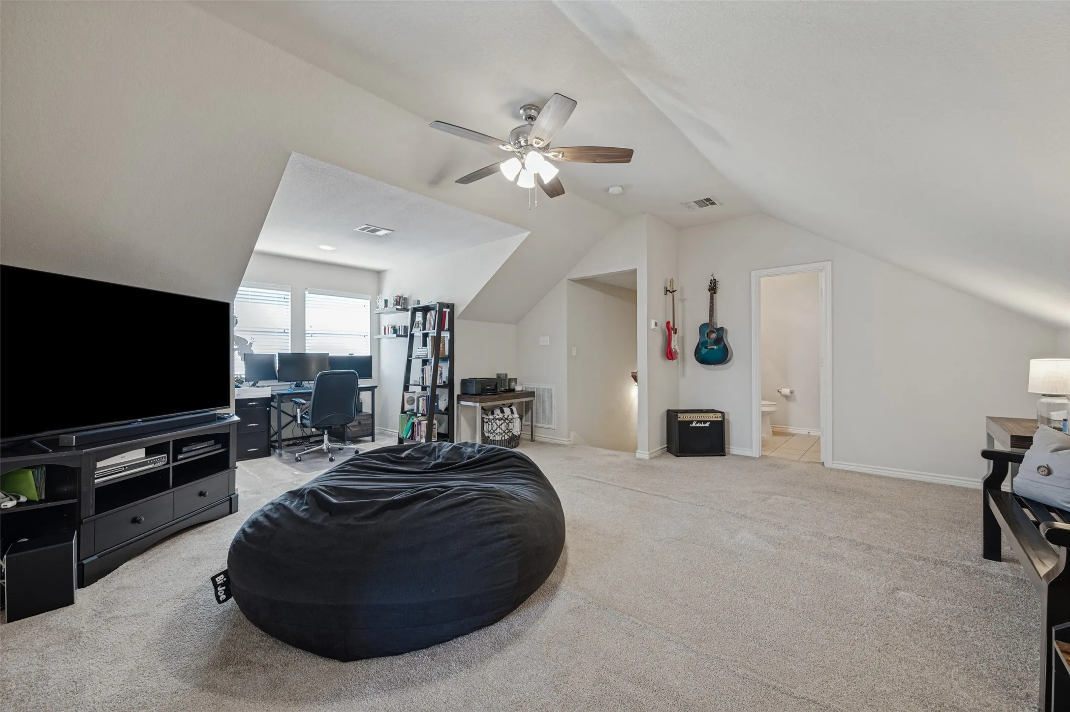 Great little get away for whomever wants to use this upstairs, movies : check , workout room : check kids play area : check, need a nook for an office space , this half story has you covered.