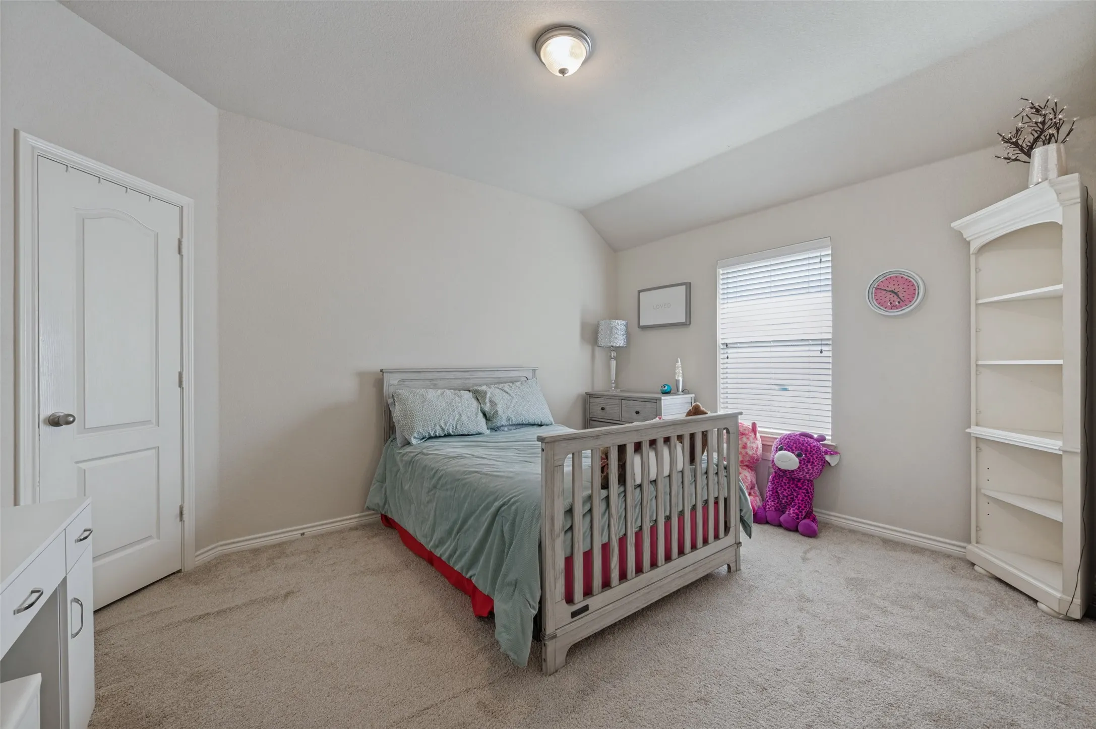 2nd bedroom , good size with walk in closet.