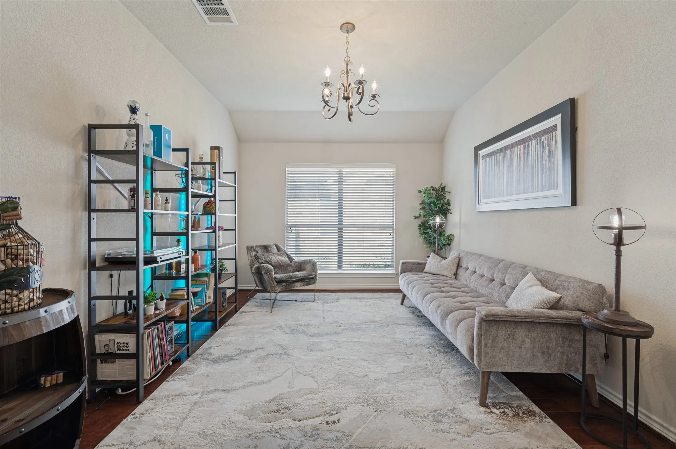 This space is utilized as little bar and music space in this home, can be used as a formal dining room if needed, but you do have the dine in area in the kitchen as well for that. Use the room as needed.