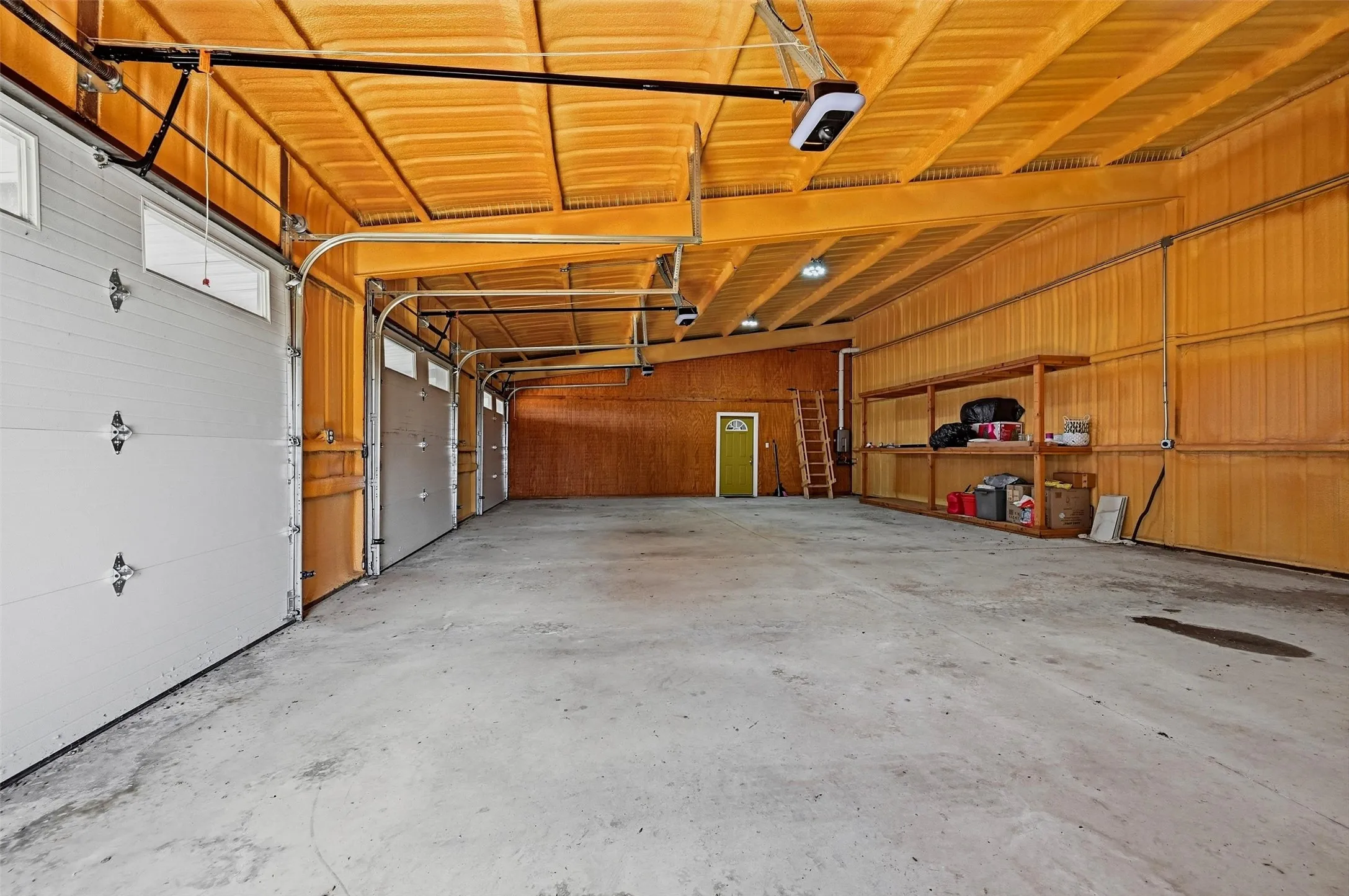 Triple garage adjoining the apartment/guest suite and the custom home.