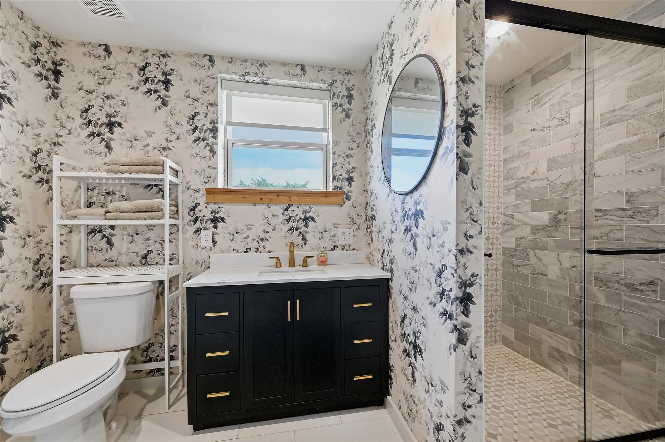Apartment/guest suite bath with oversized shower.