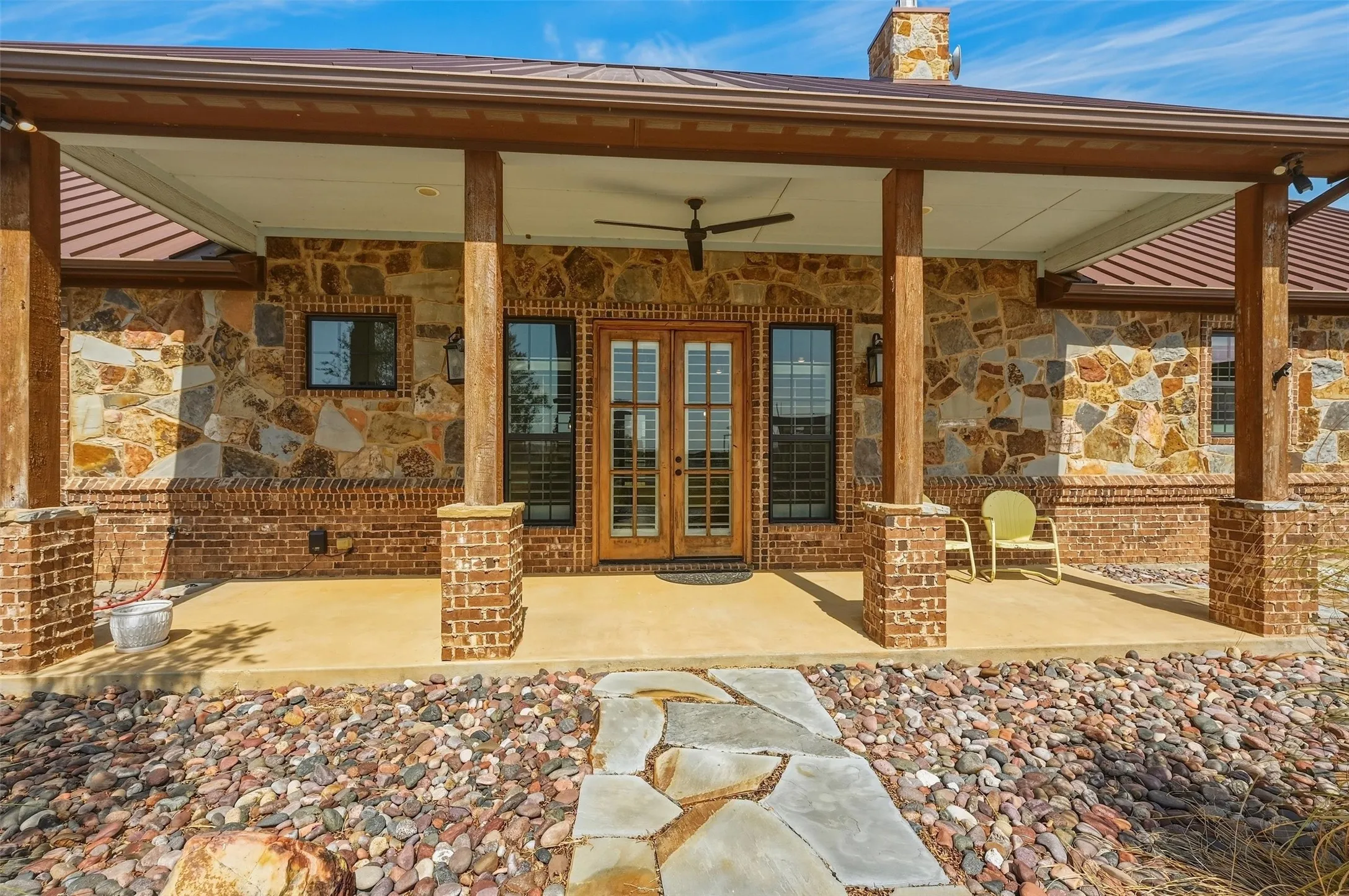 Entrance and covered front porch at 34859 US Hwy 82.