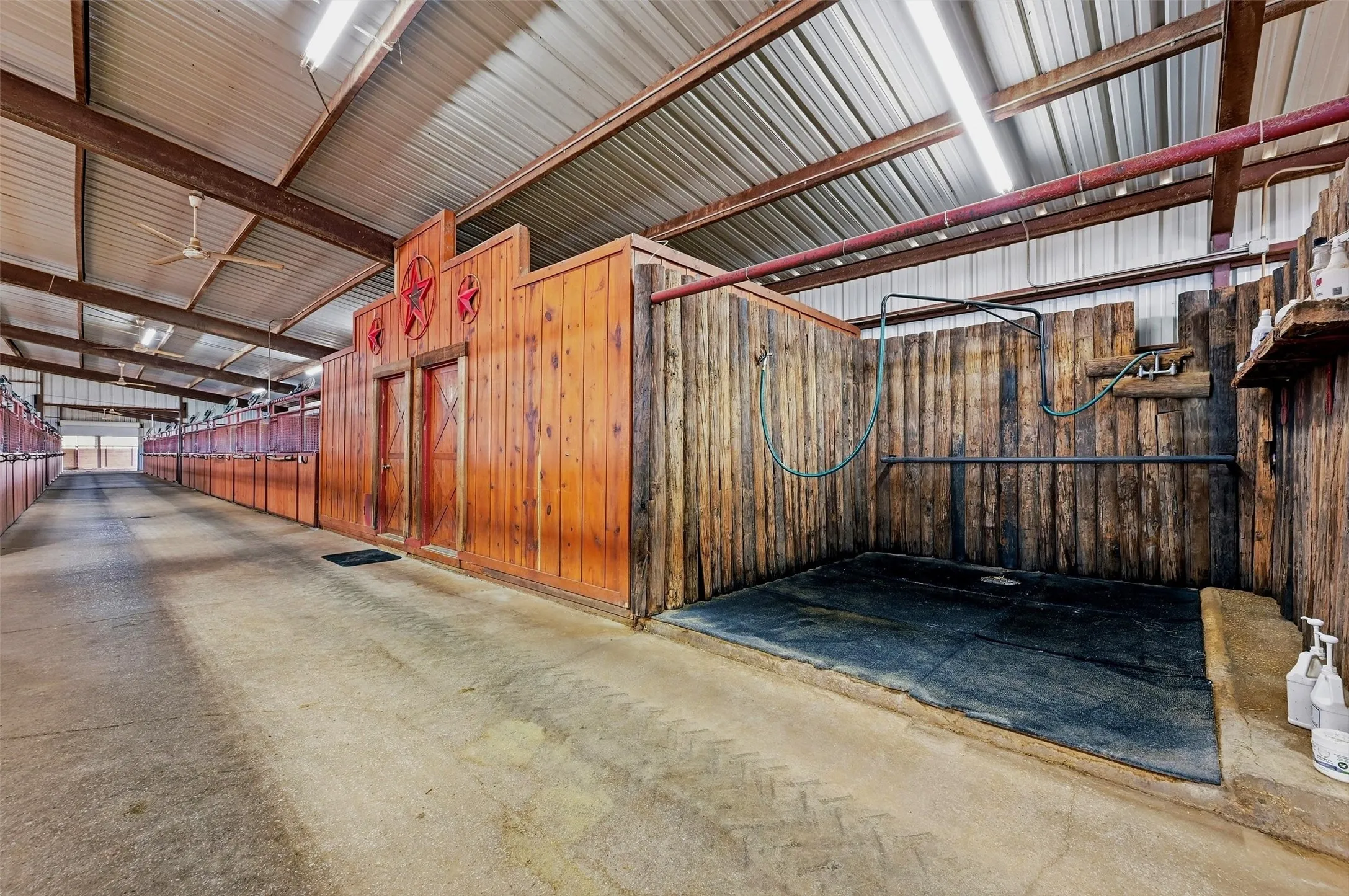 Wash rack with adjoining tack and/or storage rooms.