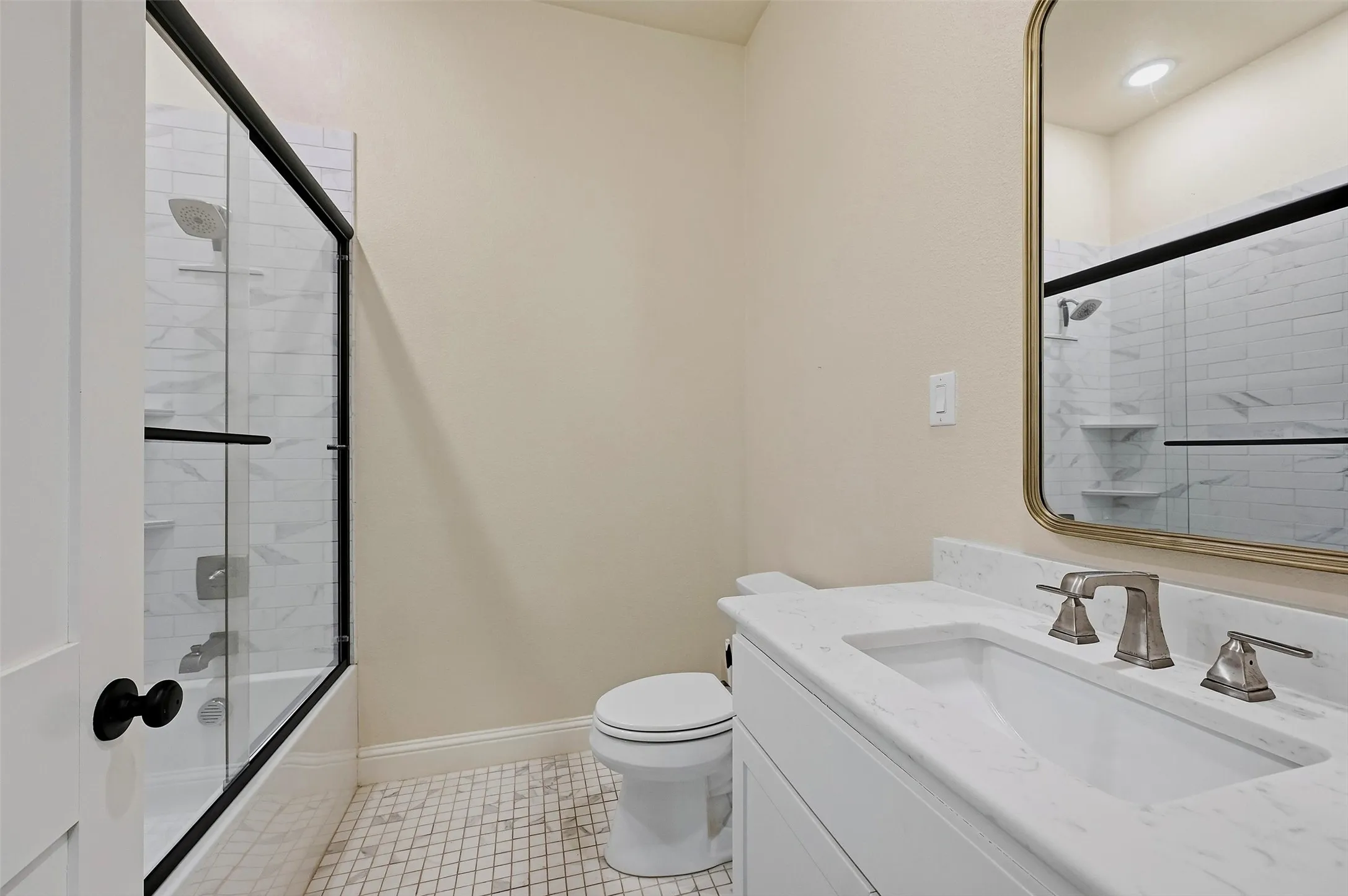 Full bath with combination bathtub/shower.