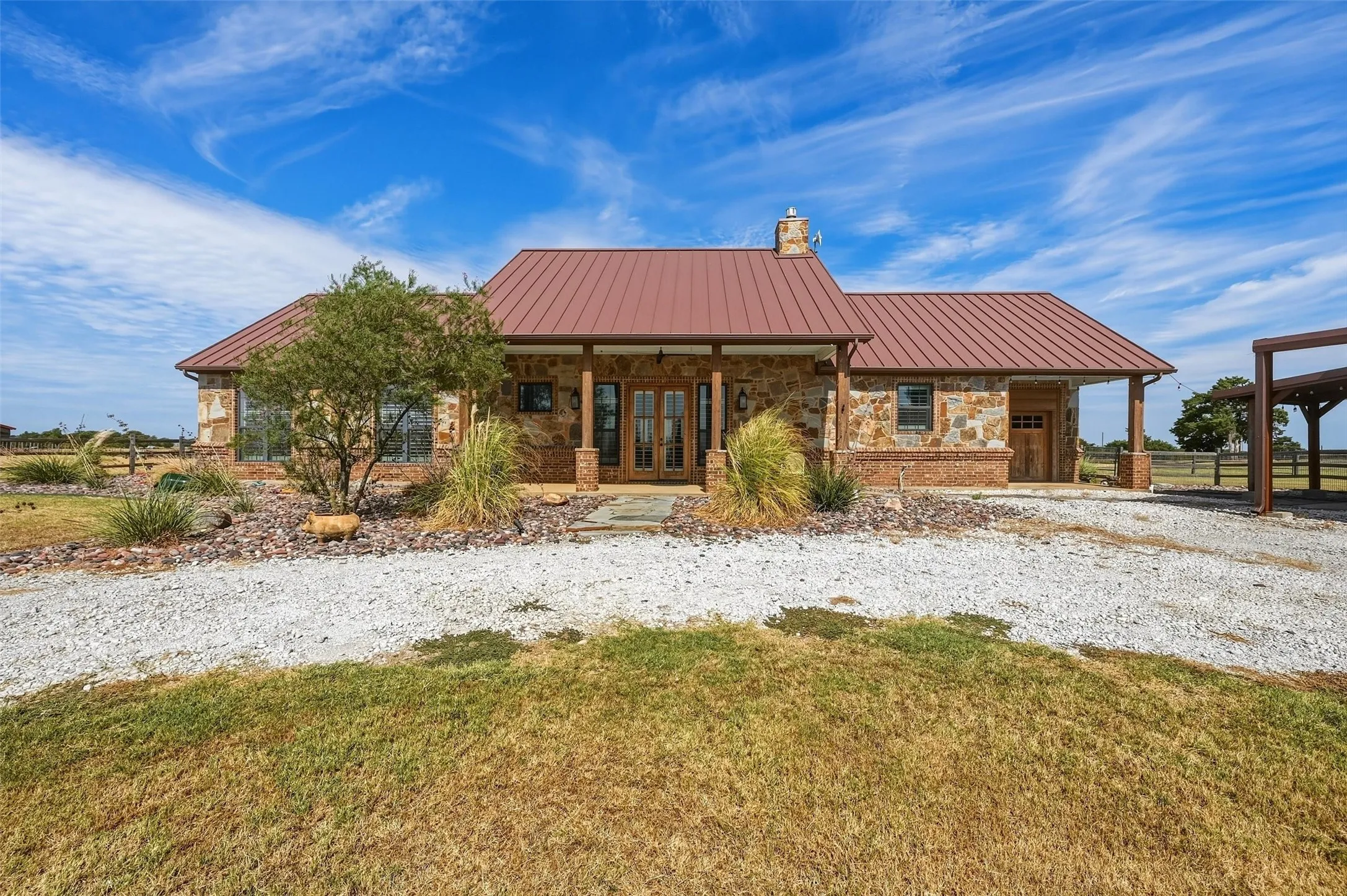 Custom built, stone & brick home at 34859 US Hwy 82.
