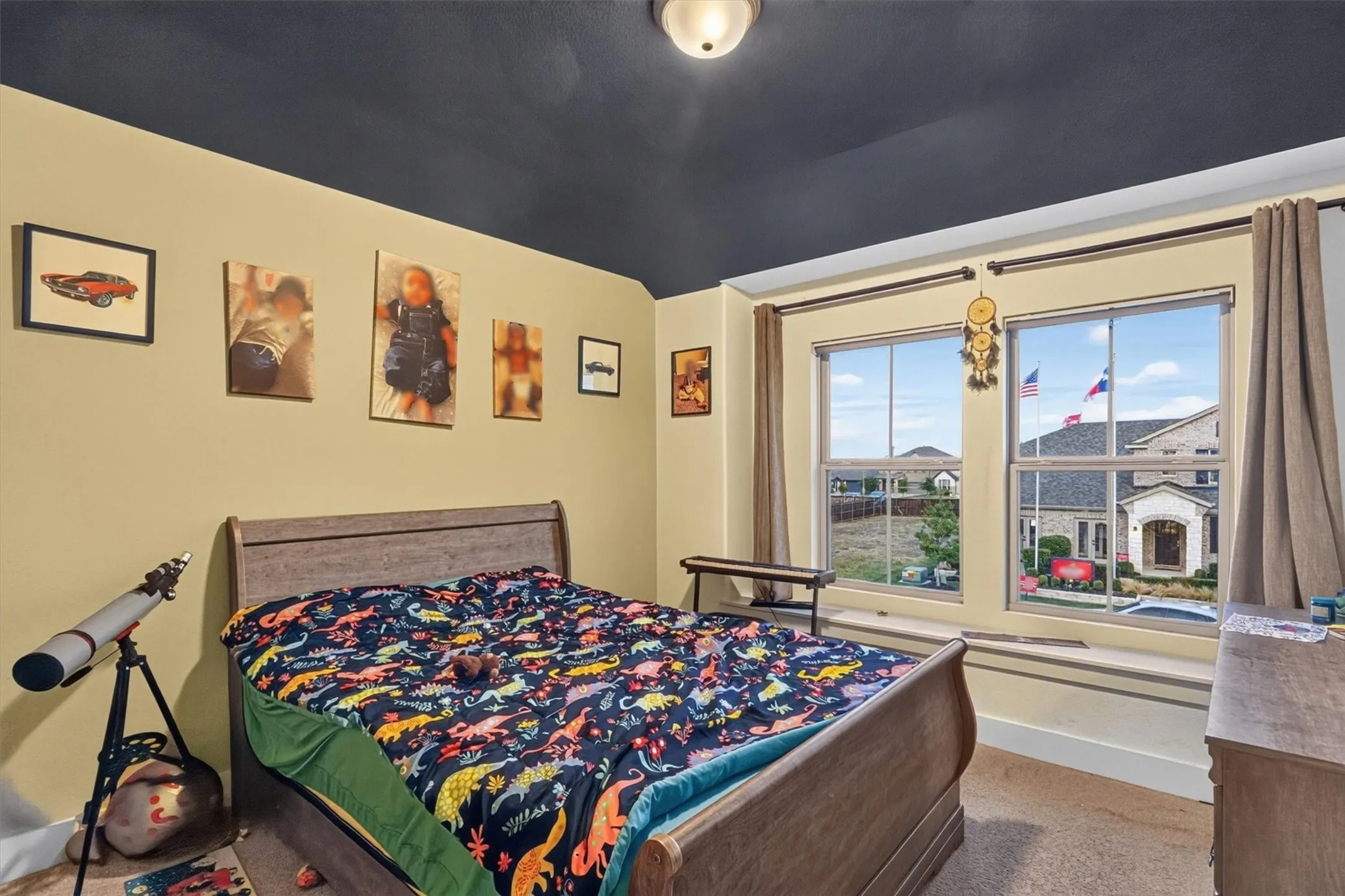 Room featuring double windows, a ceiling-mounted light fixture, and contrasting wall and ceiling colors