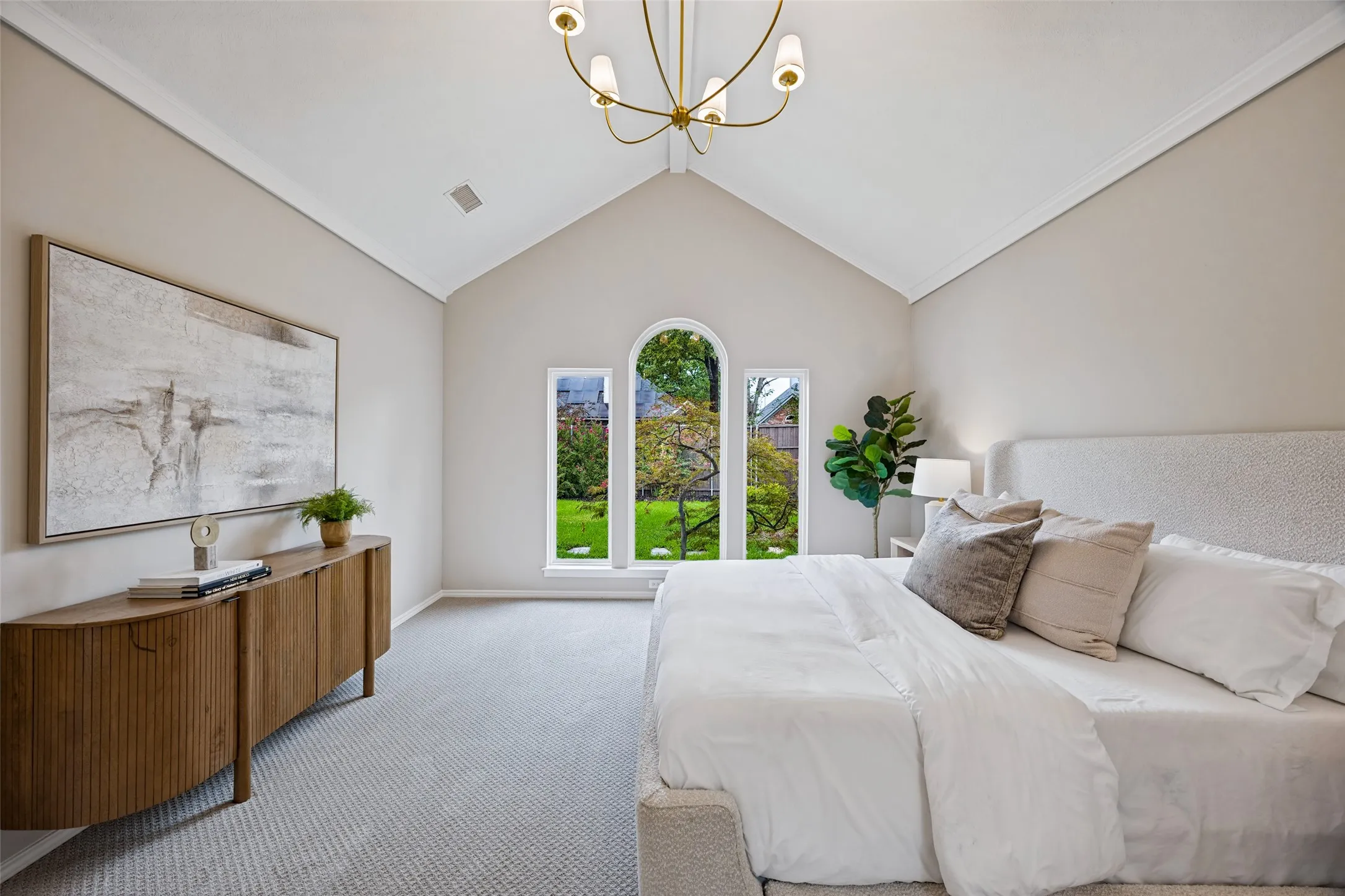 Primary suite with stunning Japanese Maple tree in outside the window