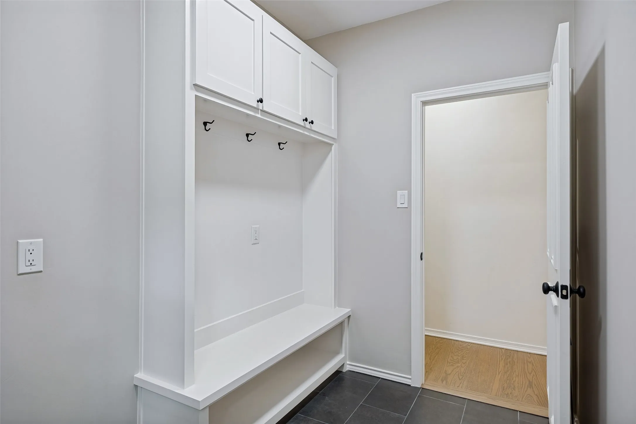 Full oversized walk-in mud-room at garage entry
