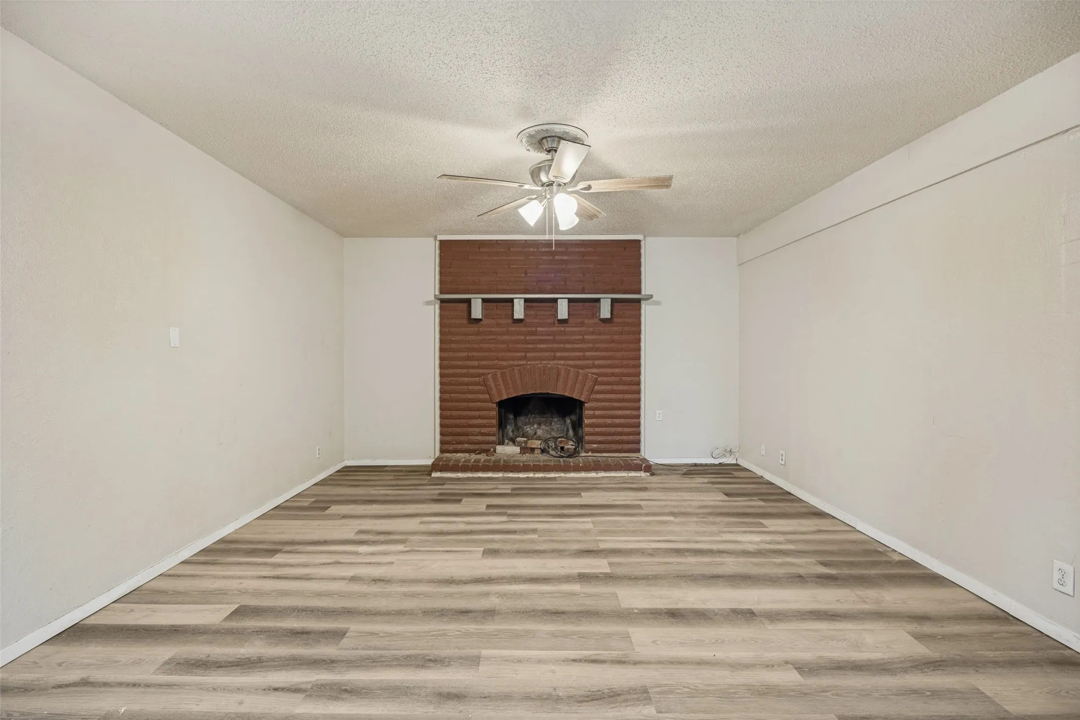 Brick fireplace with an arched firebox