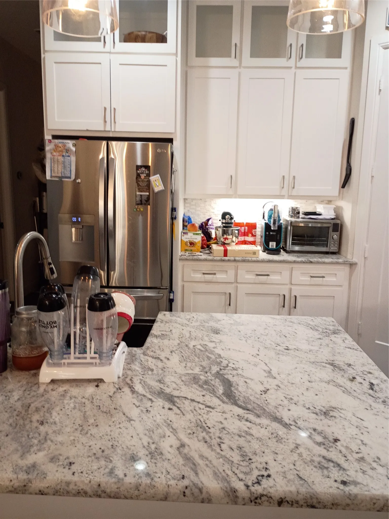 More of the kitchen. Dishwasher and sink are on the island