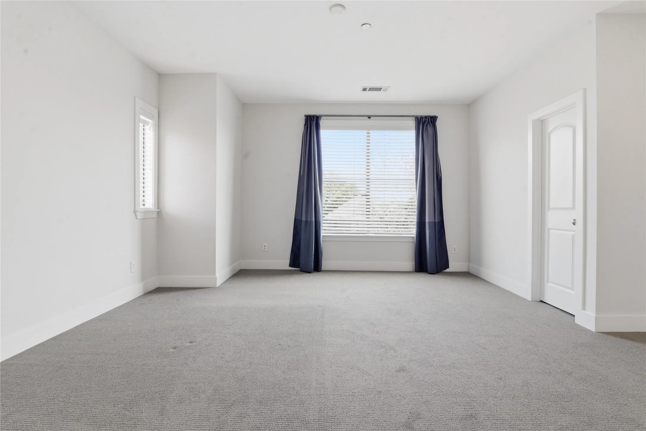 Oversized suite with large walk in closet off of bathroom and extra closet located in the bedroom.