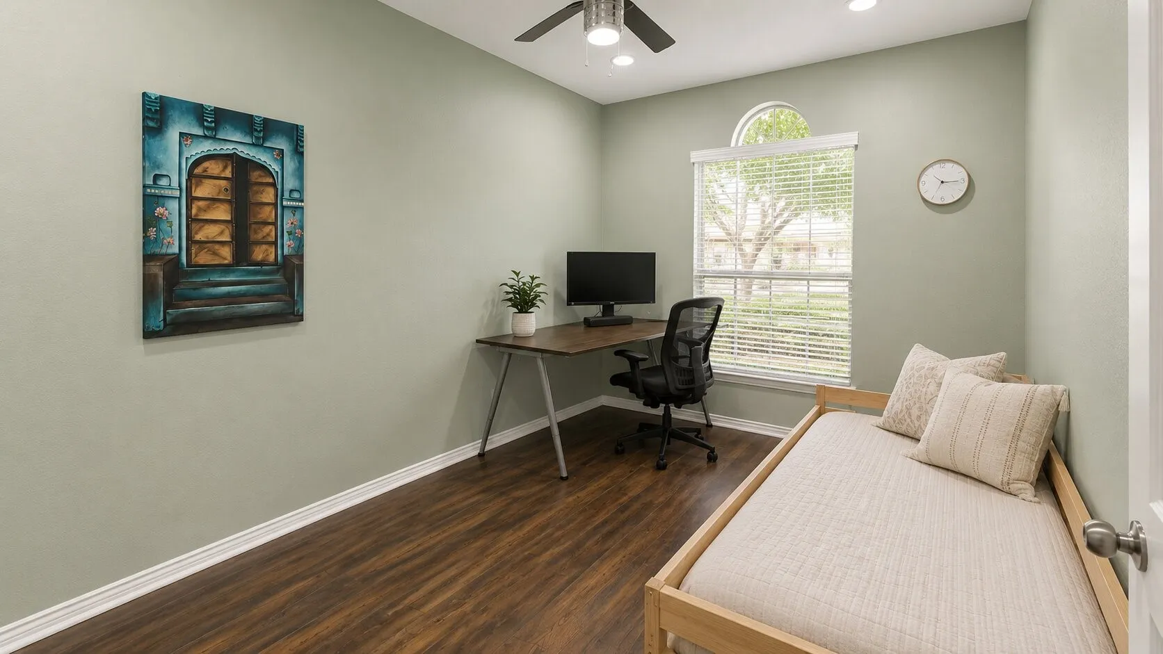 Recessed lighting, wood-finish flooring, ceiling fan, arched window, and window blinds