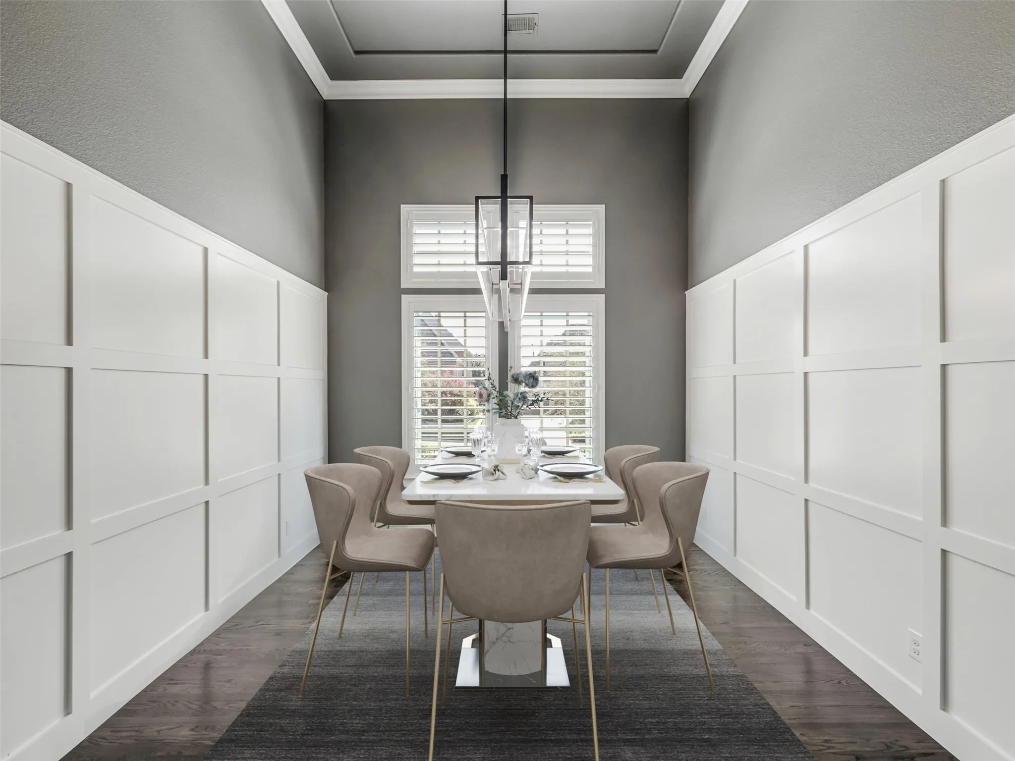 For formal entertaining, the dining room has been elevated with extensive custom detailing, including approximately eight-foot paneling and a fully trimmed archway. Plantation shutters, accent paint added in 2022, and a Restoration Hardware light fixture complete the sophisticated space. VIRTUALLY STAGED.