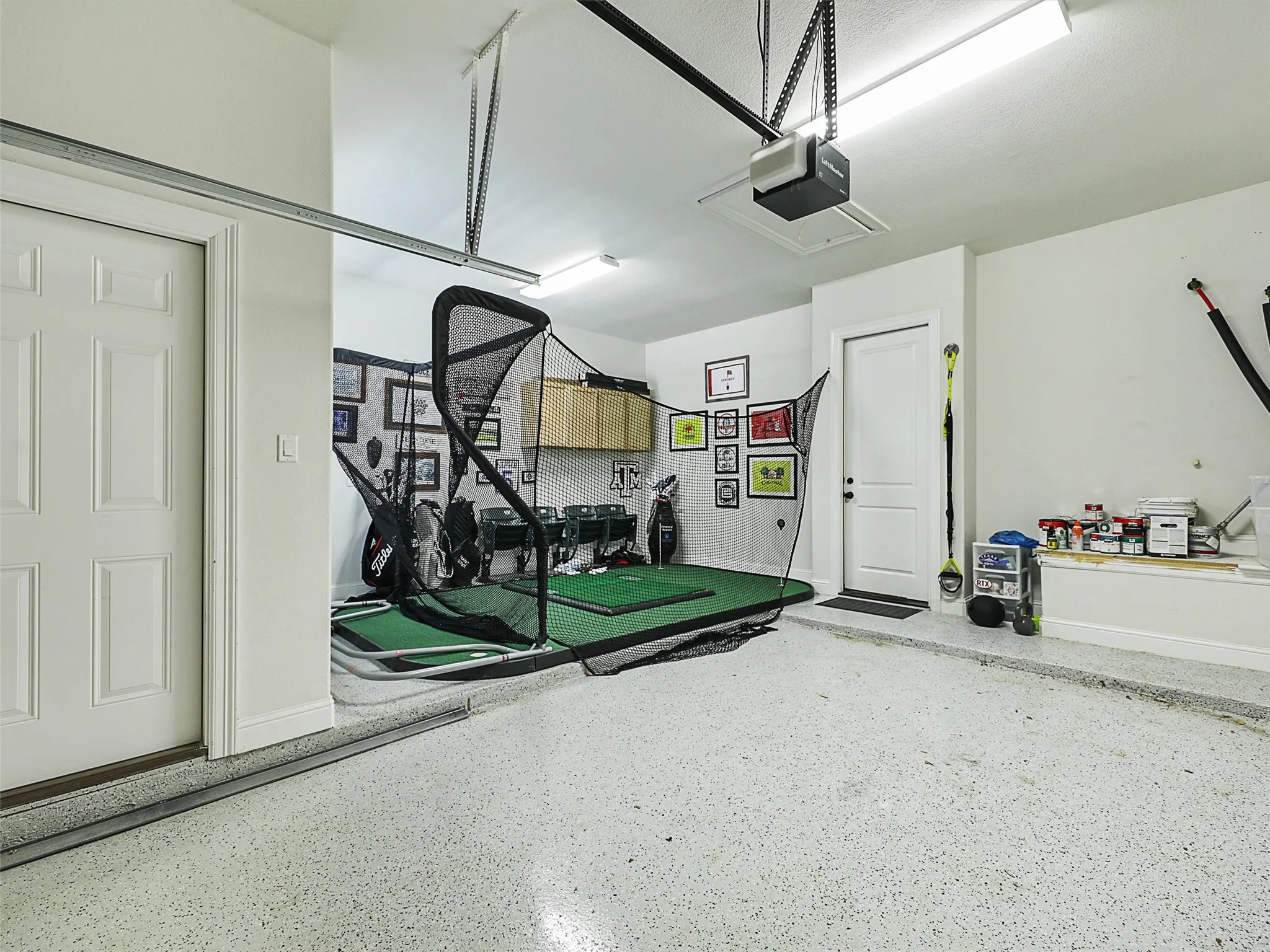 Even the garage configuration offers something unexpected. The split three-car garage provides an unusually generous footprint comparable in overall space to many five-car garages due to bonus landing areas incorporated into both garage locations. Garage #1 measures approximately 20 by 27 feet, while Garage #2 measures approximately 21 by 22 feet, offering substantial room for vehicles, storage, equipment, or hobby needs. Garage door coils and rollers were replaced in 2024.