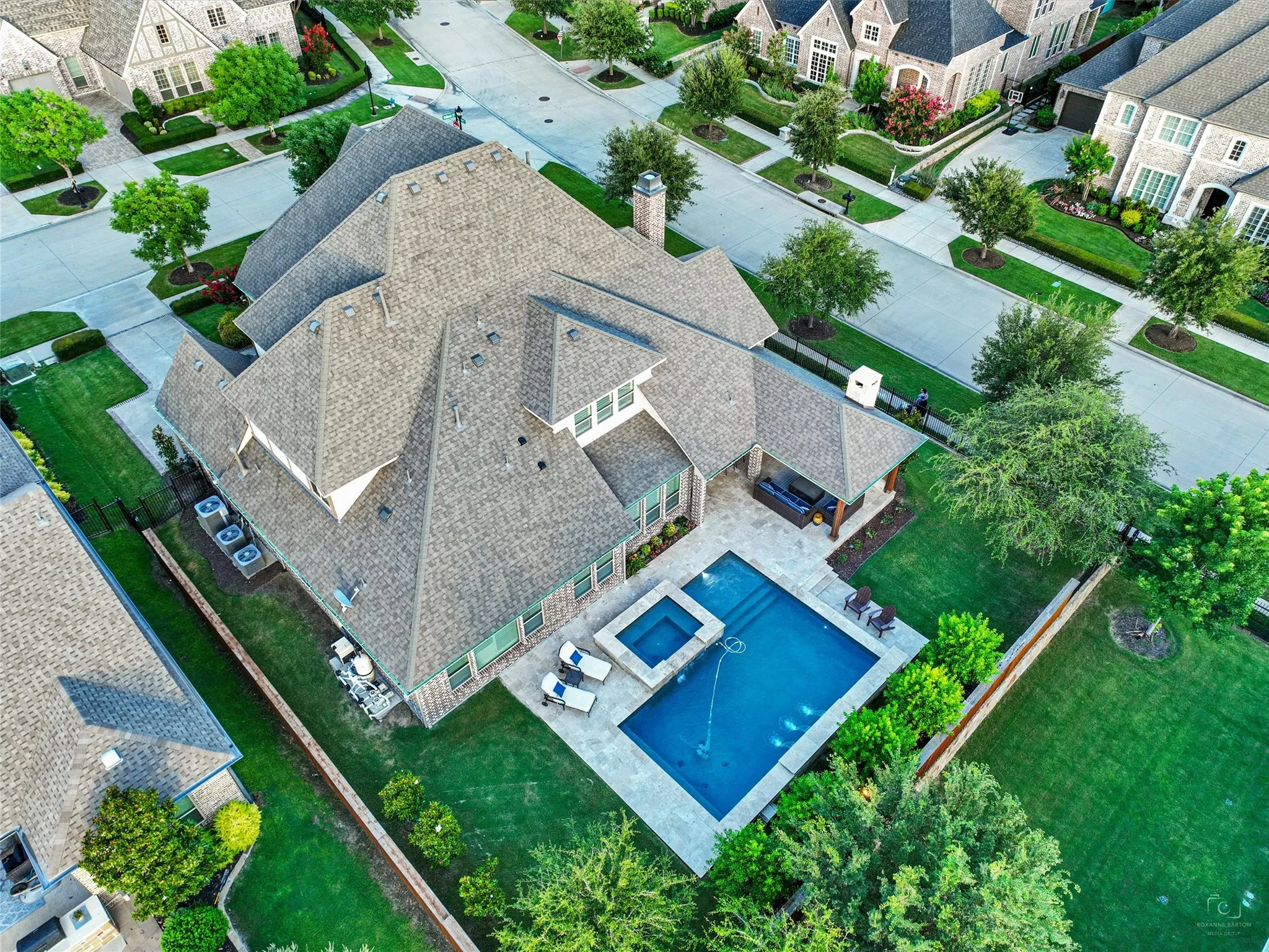 HUGE OPEN YARD SPACES. GREAT for play, pets, and family entertaining. From the climate-controlled 800-bottle wine cellar and custom interior finishes to the Foley pool, oversized spa, limestone outdoor living center, extensive garage space, and numerous recent mechanical and exterior improvements, this Newman Village residence has been thoughtfully enhanced at nearly every turn. Designed for those who appreciate quality craftsmanship, generous entertaining spaces, and resort-inspired outdoor living, the home delivers an exceptional combination of elegance, functionality, and comfort in one of the area's distinctive residential communities.