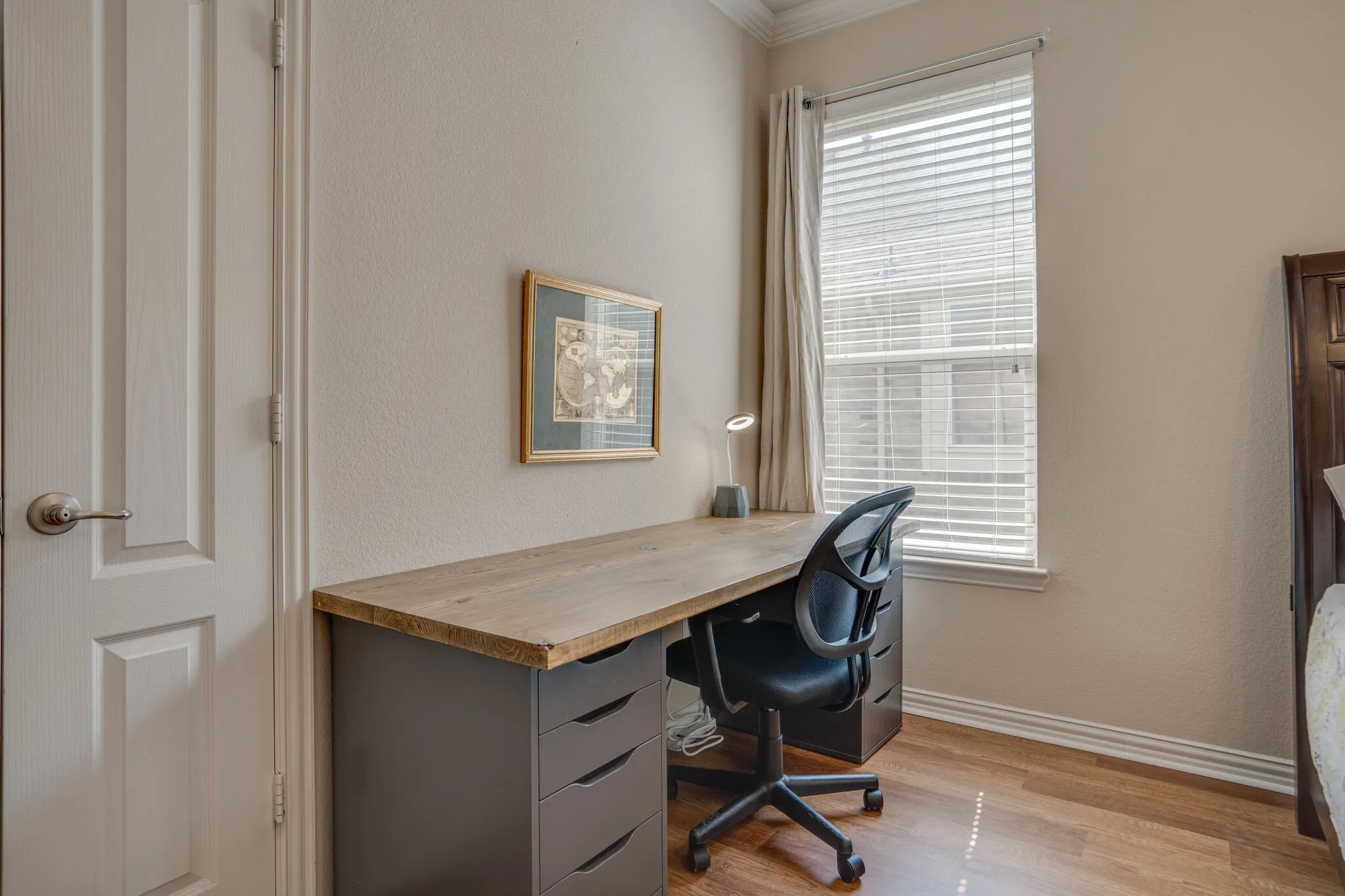 Wood-finish flooring with baseboard trim