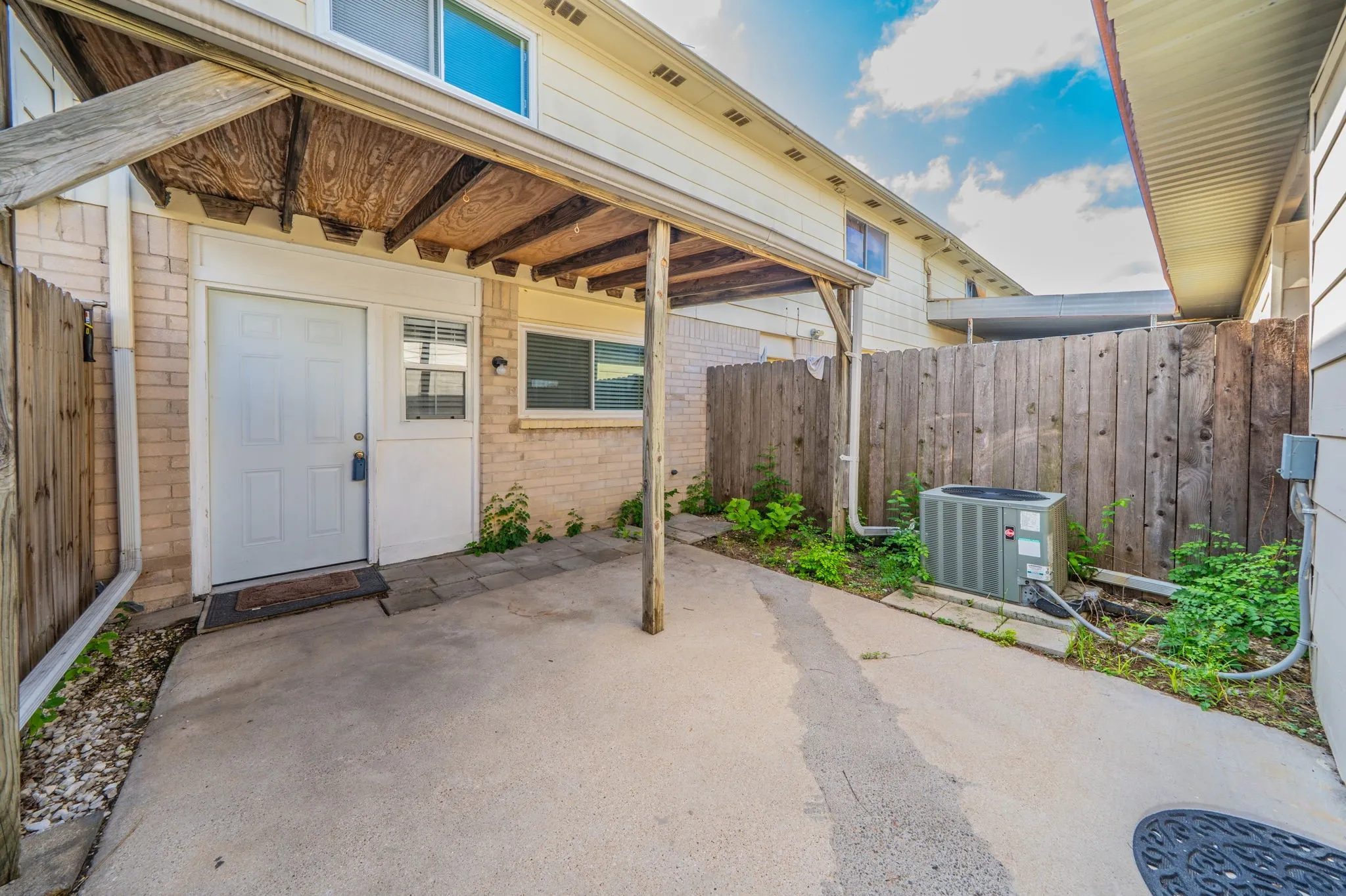 Covered patio and laundry storage​​‌​​​​‌​​‌‌​‌‌​​​‌‌​‌​‌​‌​​​‌​​ room