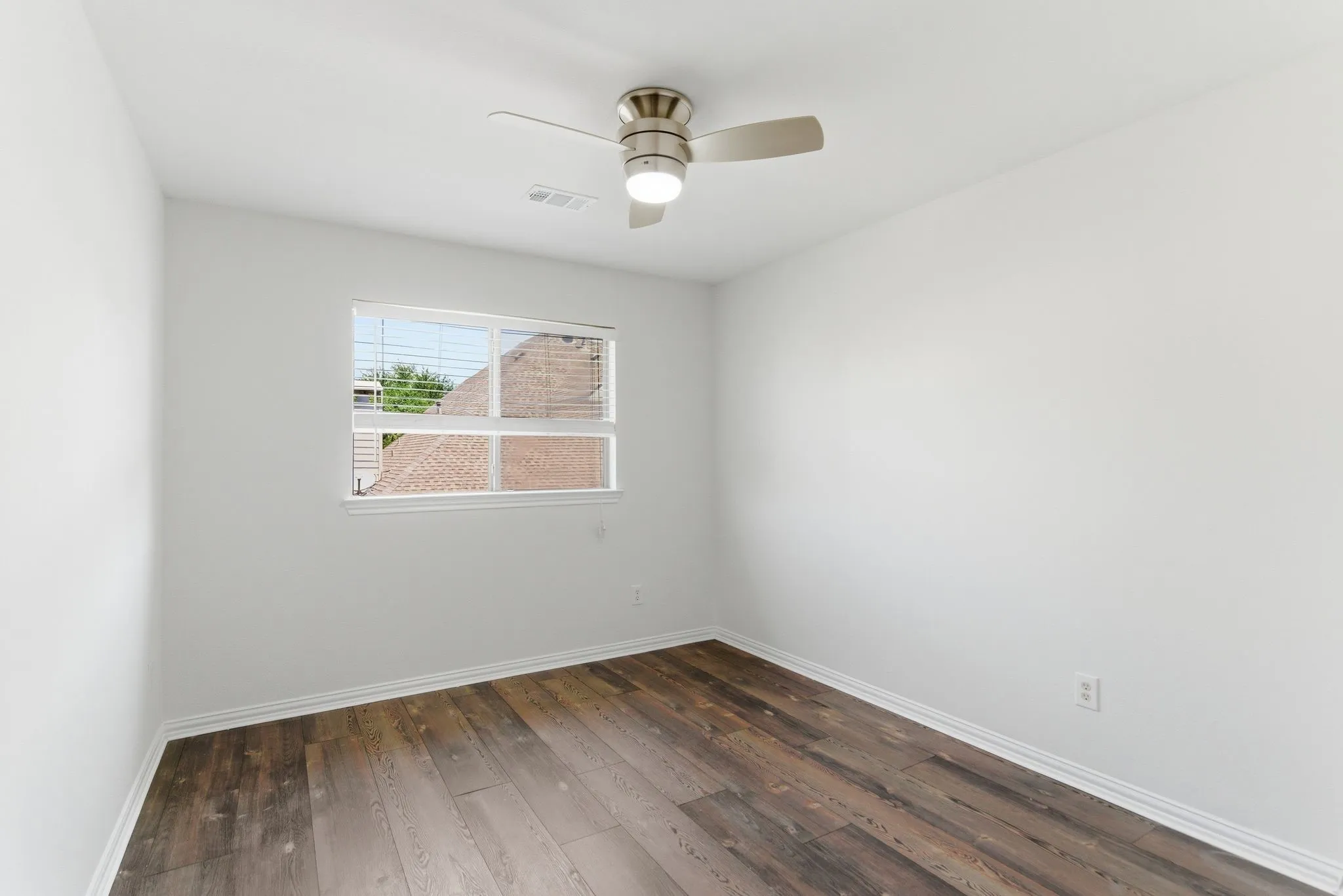 Bright white walls and wood-finish flooring