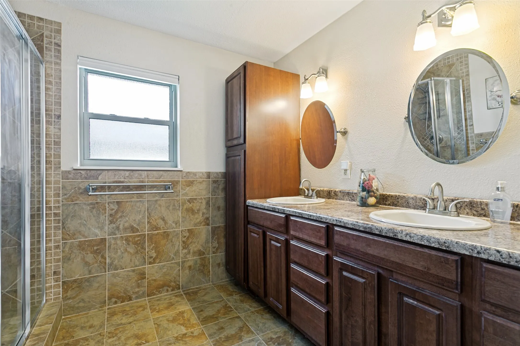 Dual vanity with undermount sinks and brushed nickel fixtures