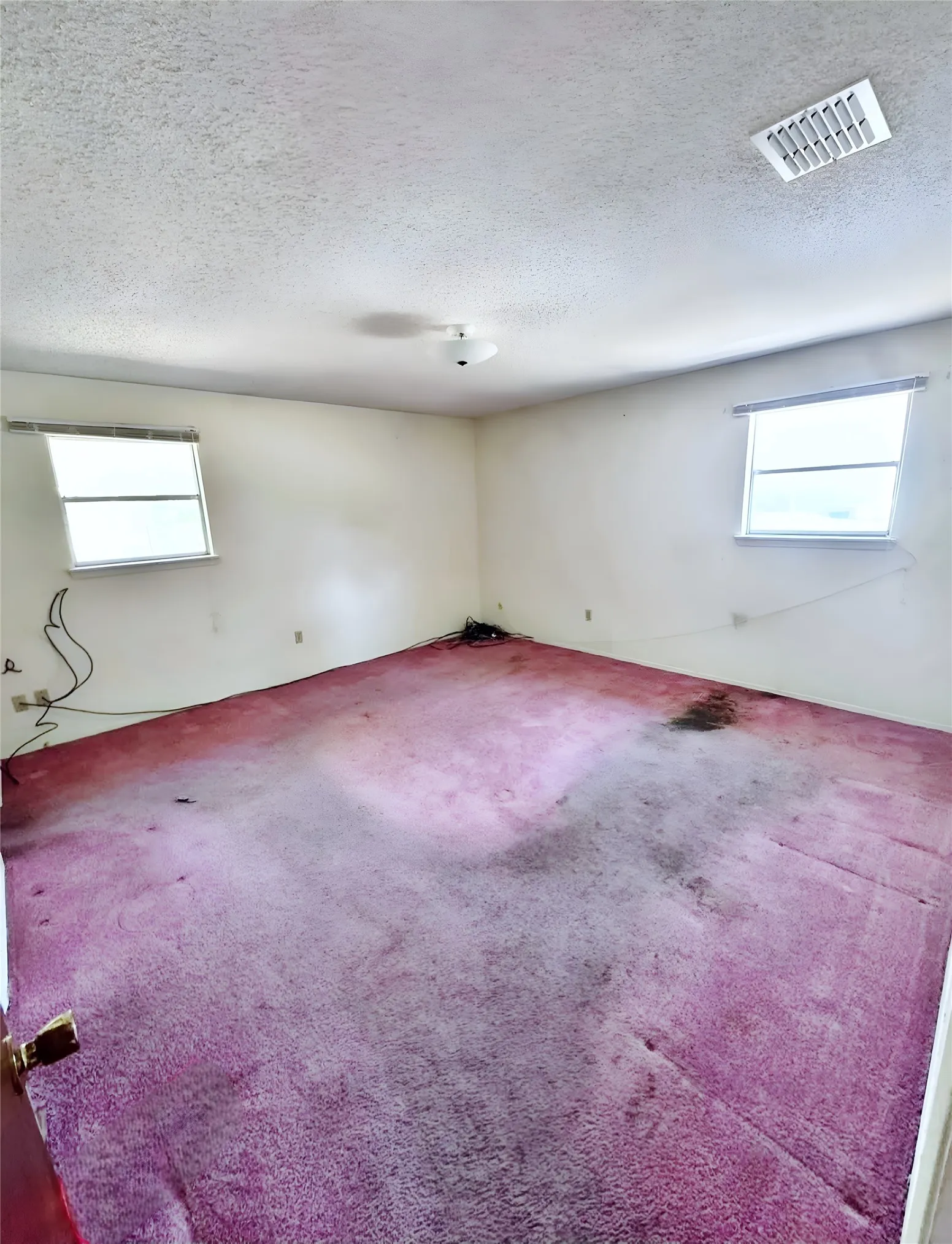 Generously sized 15' x 14"5" primary bedroom with natural light and wonderful potential to create a personalized retreat.