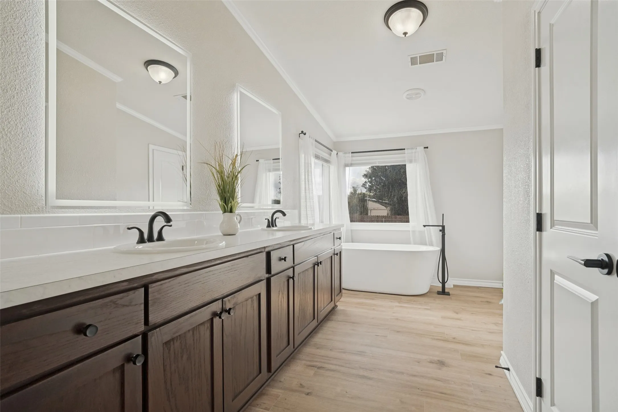Primary bath with dual vanity