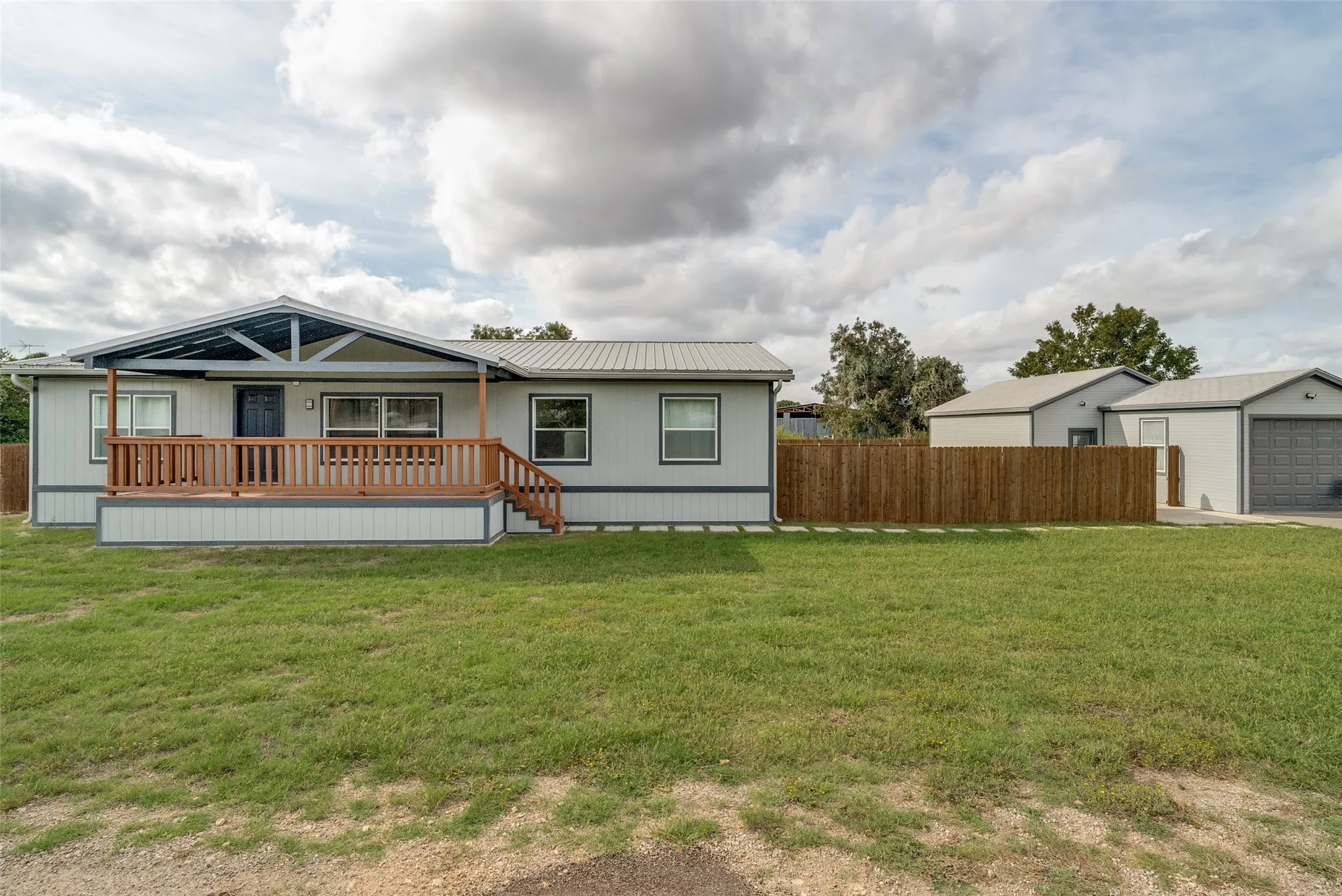 Front exterior and yard