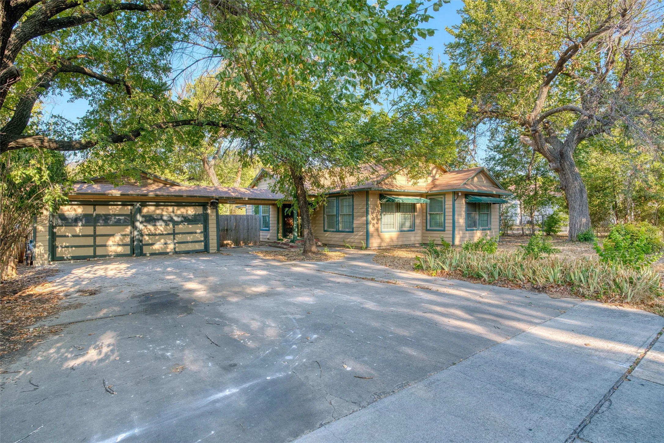 Driveway, garage and home