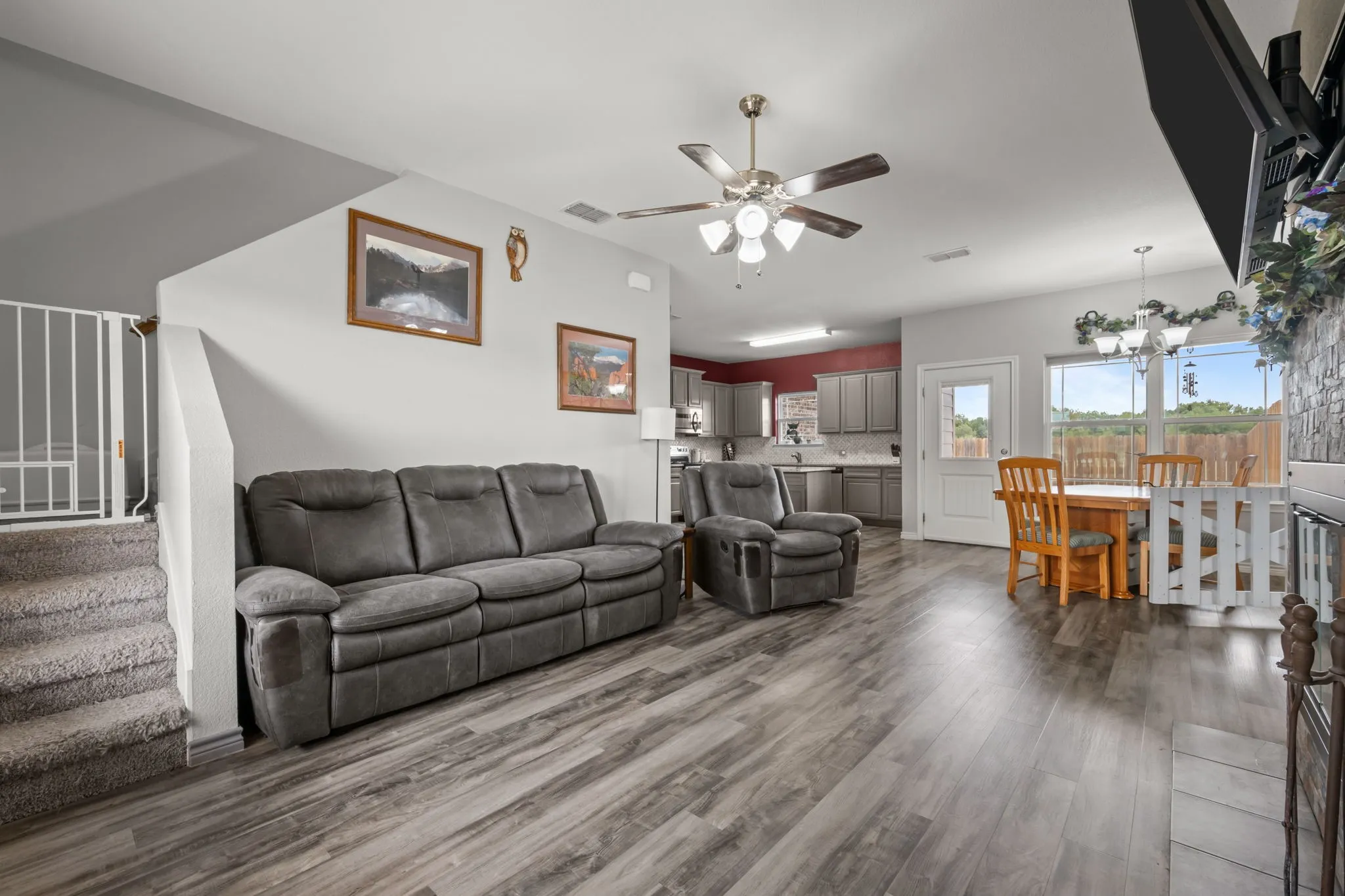 Living room open to dining and kitchen