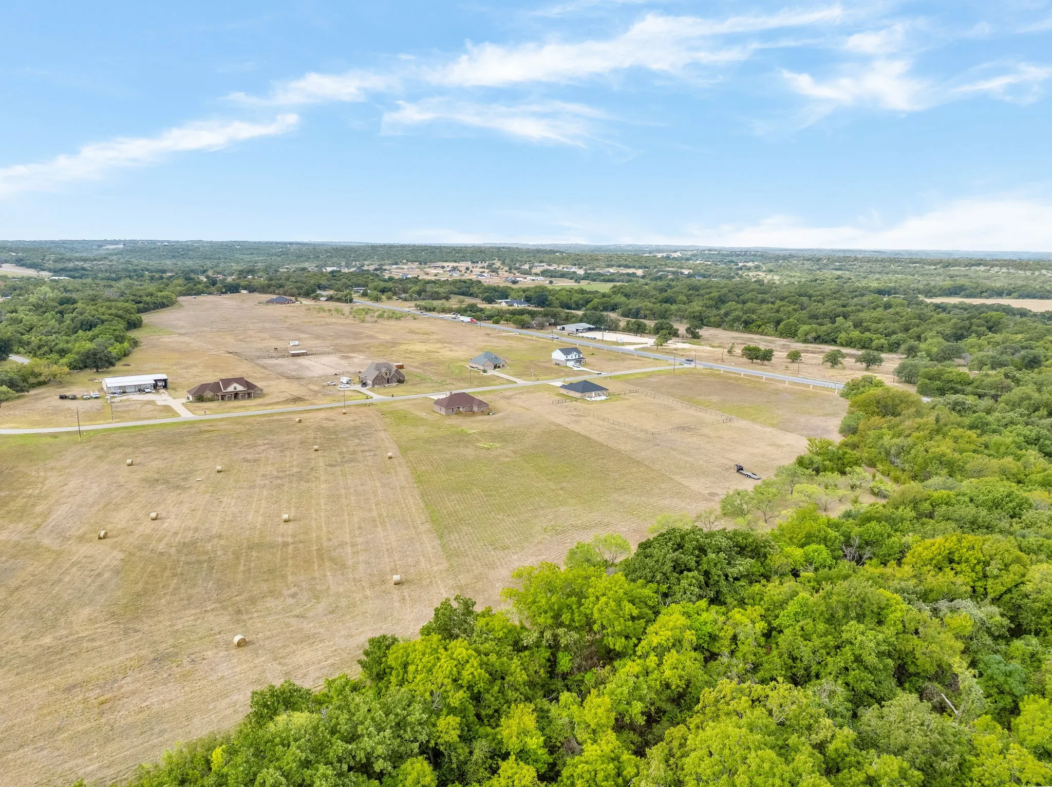 Drone view of surrounding land and trees