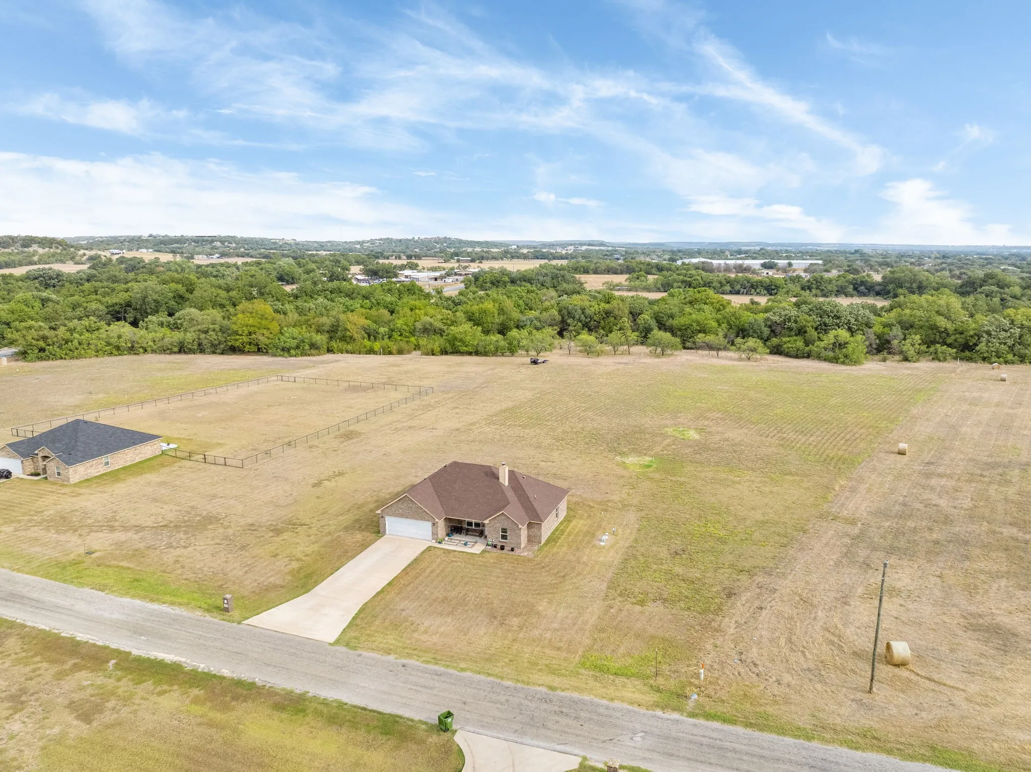 Drone view of home and acreage