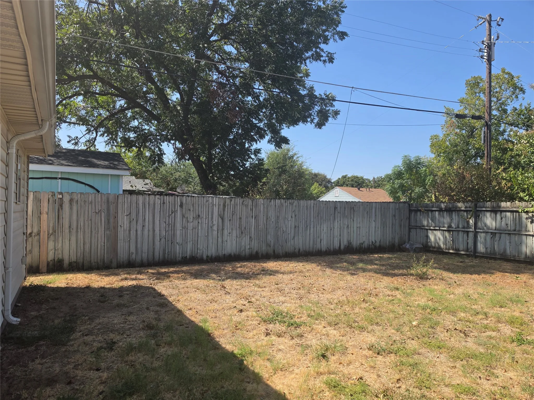 large fenced in backyard