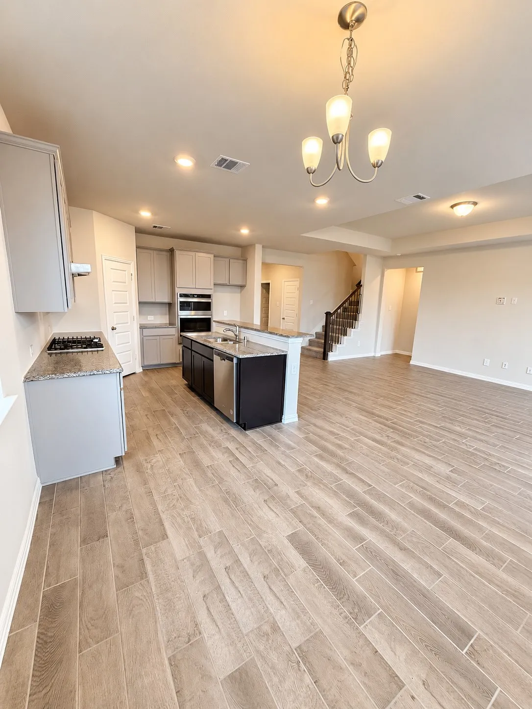 Wood-finish plank flooring throughout