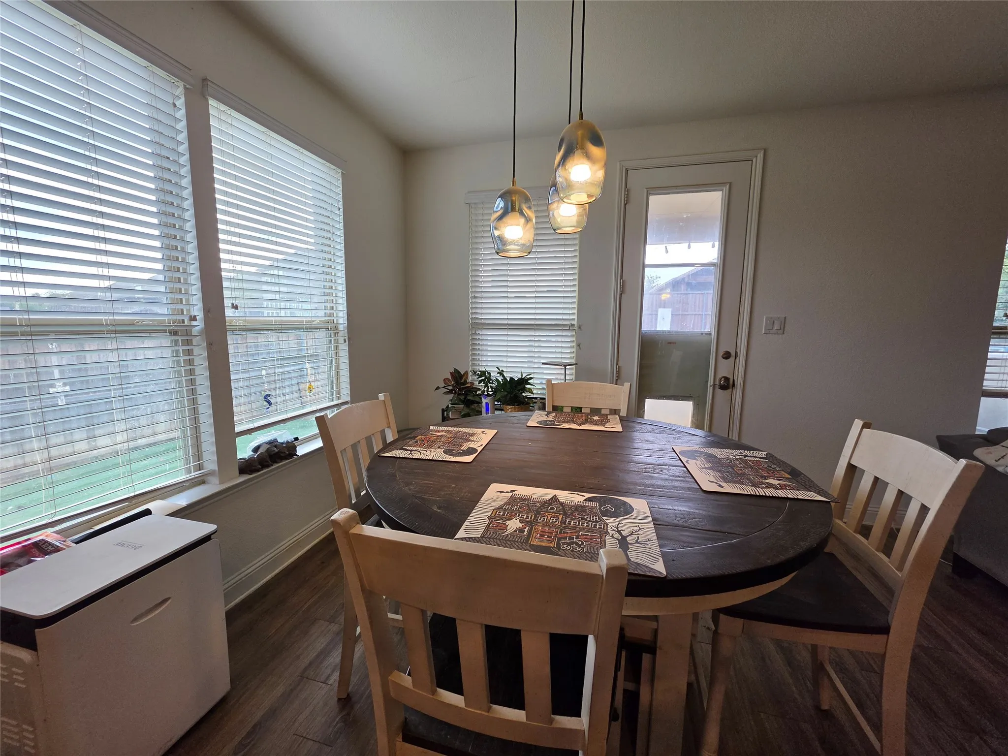 Wood-finish flooring throughout