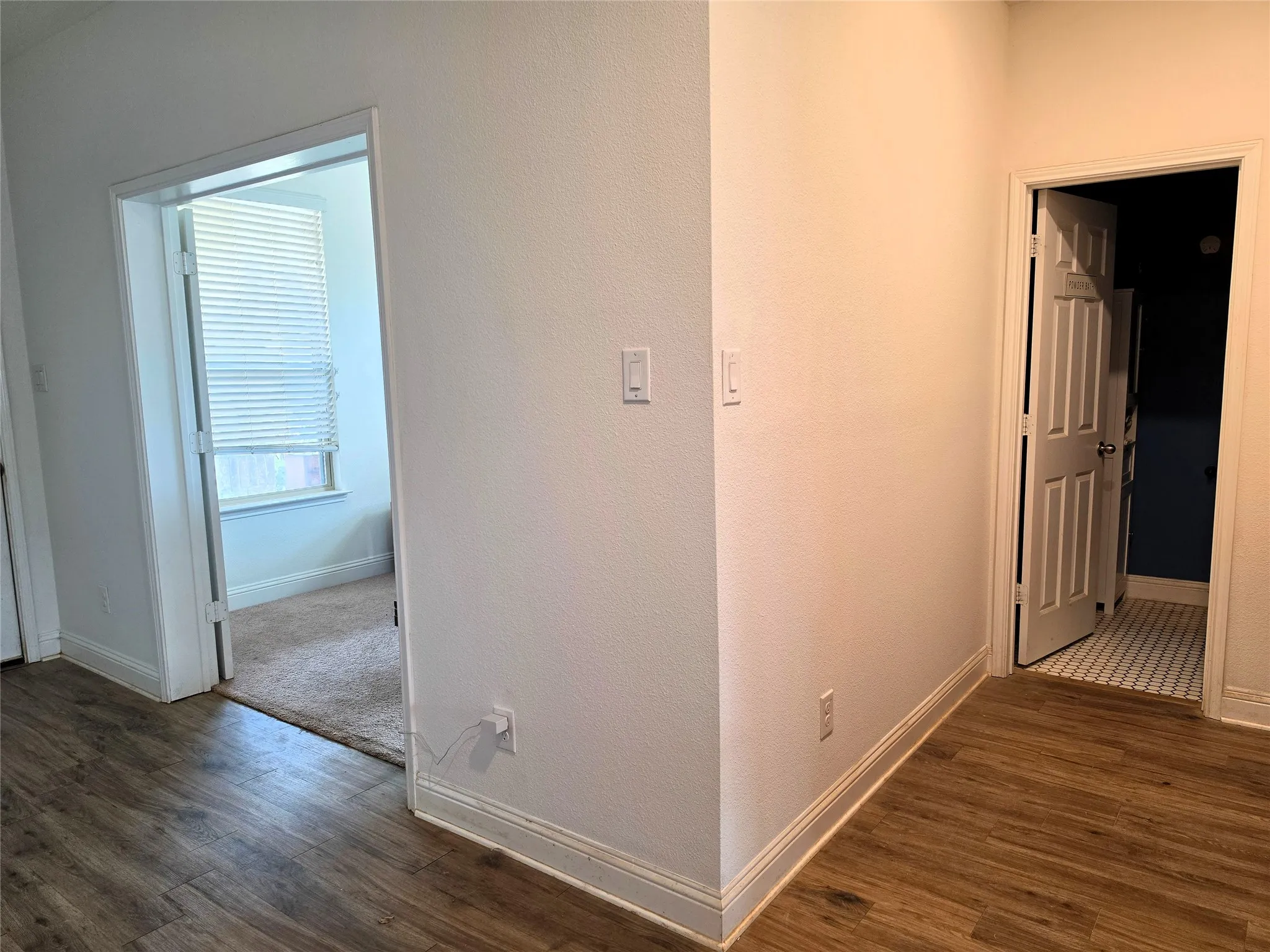 Wood-finish flooring throughout the main area