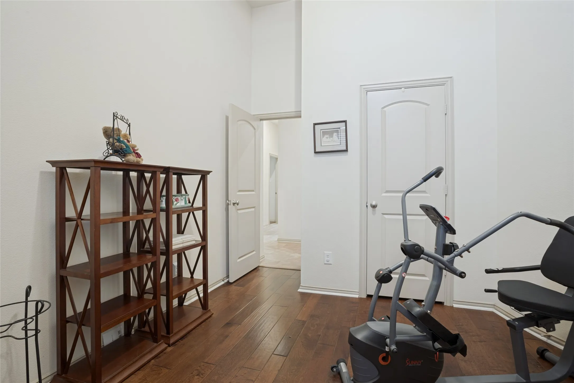 Currently set up as a workout room, this spacious secondary bedroom showcases the versatility of the home's flexible floor plan. Perfect for a home gym, guest bedroom, hobby room, or whatever best fits your lifestyle.
