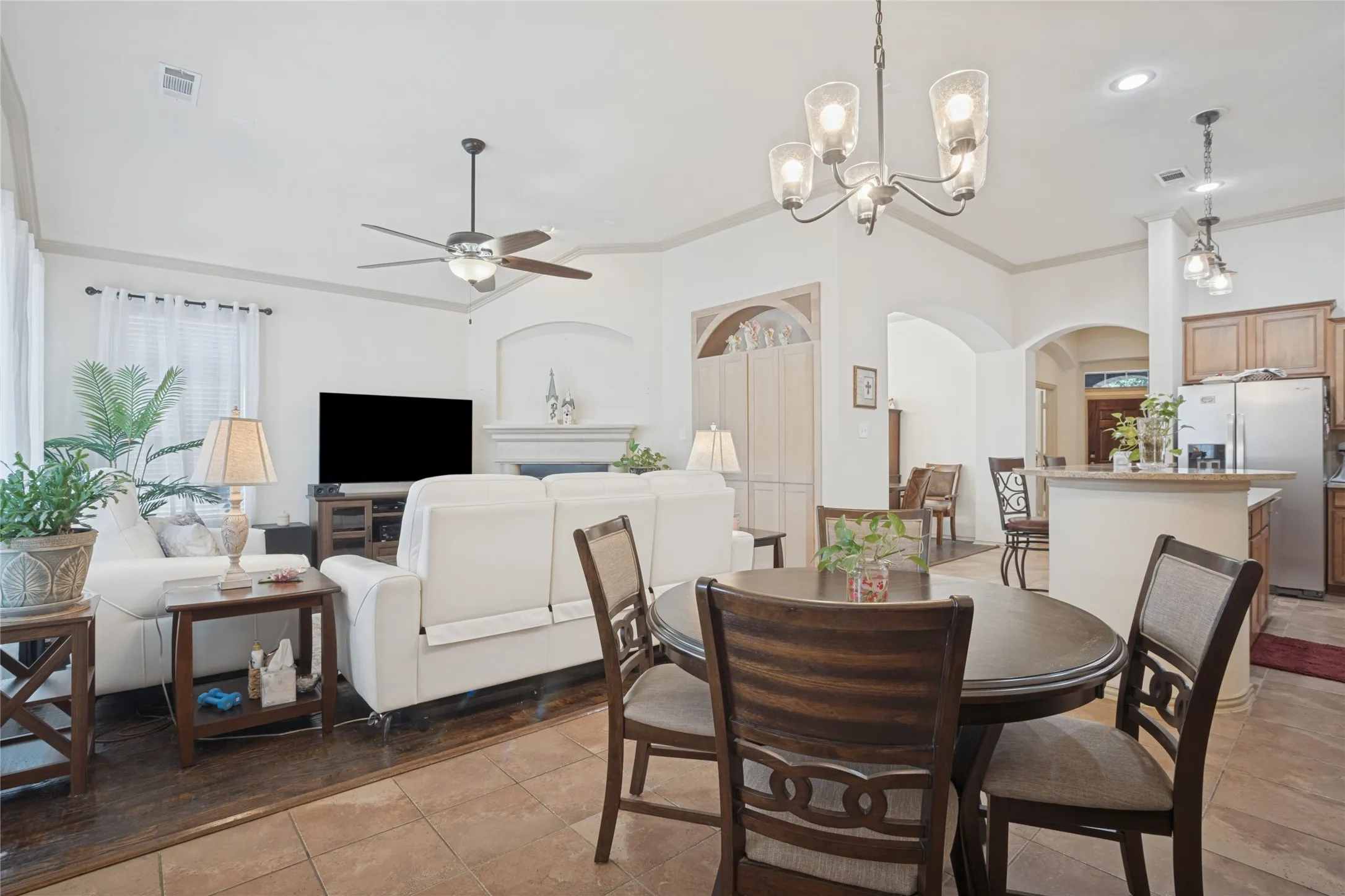The charming breakfast nook offers a cozy spot to enjoy your morning coffee, casual family meals, and everyday moments, all while taking in views of the backyard.
