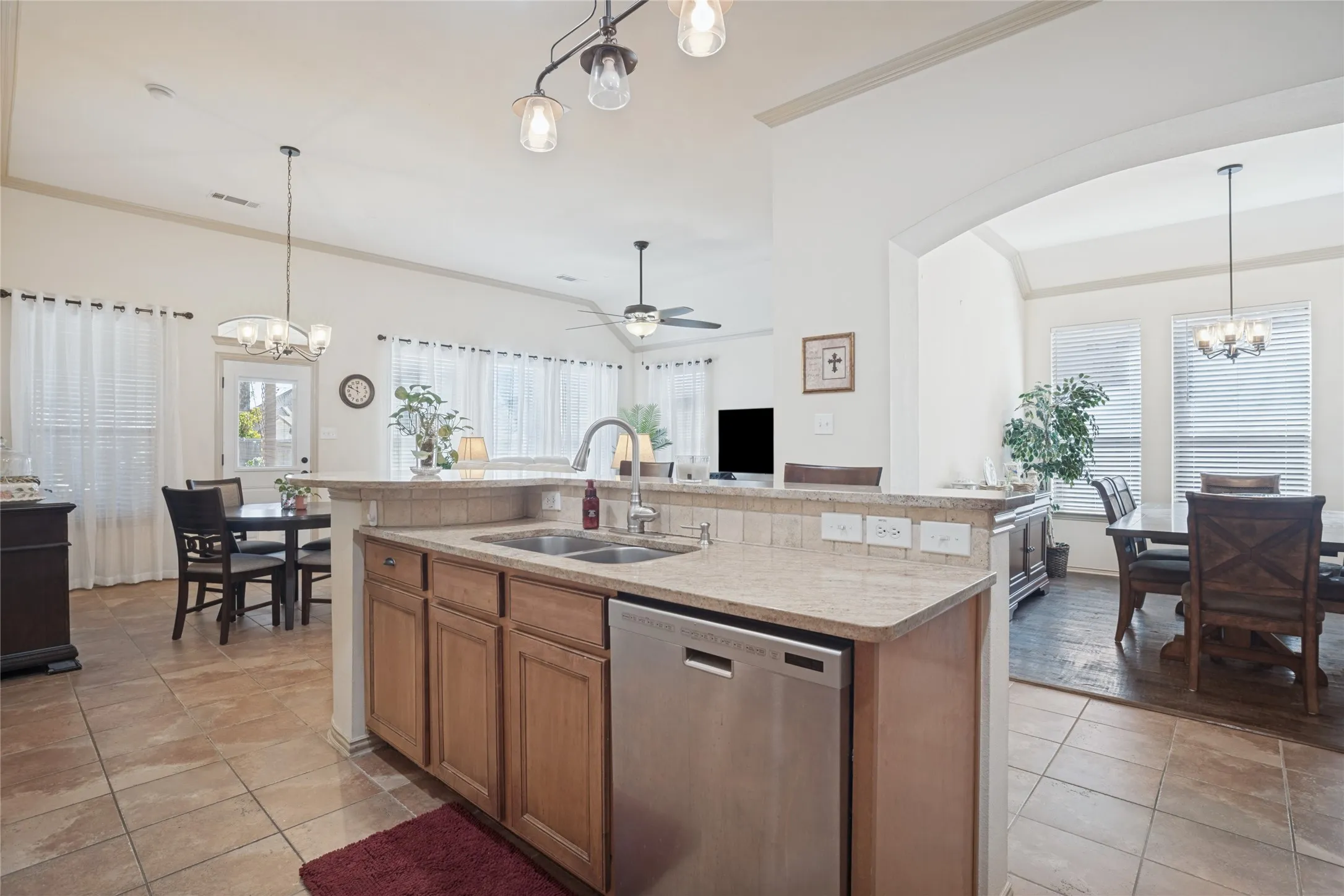 Plenty of room for everyone to gather and make memories! The open kitchen and dining spaces provide a welcoming setting for holiday celebrations, family dinners, and entertaining loved ones year-round.
